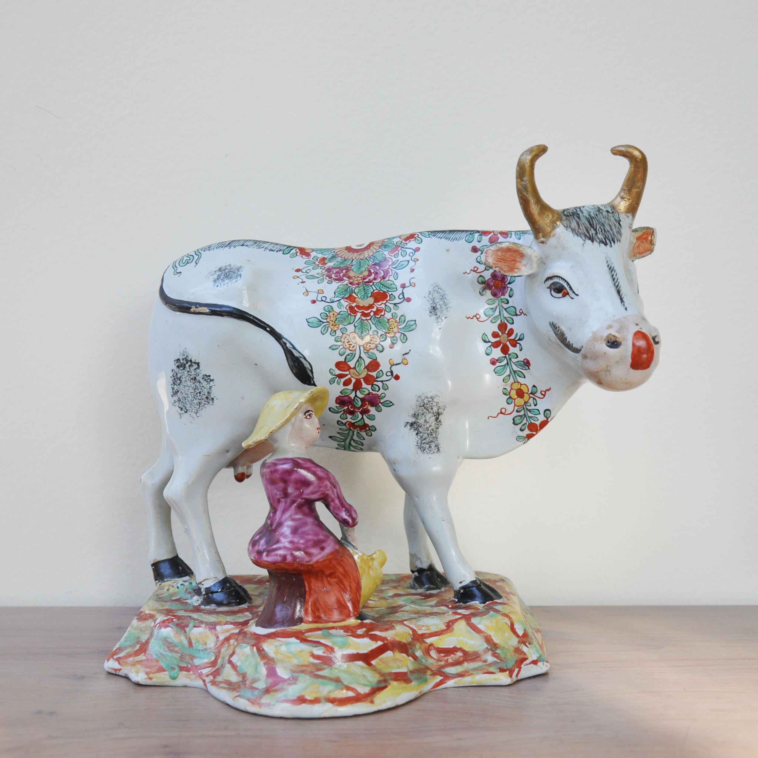 Polychrome Delft Cow with Seated Figure, Circa 1760