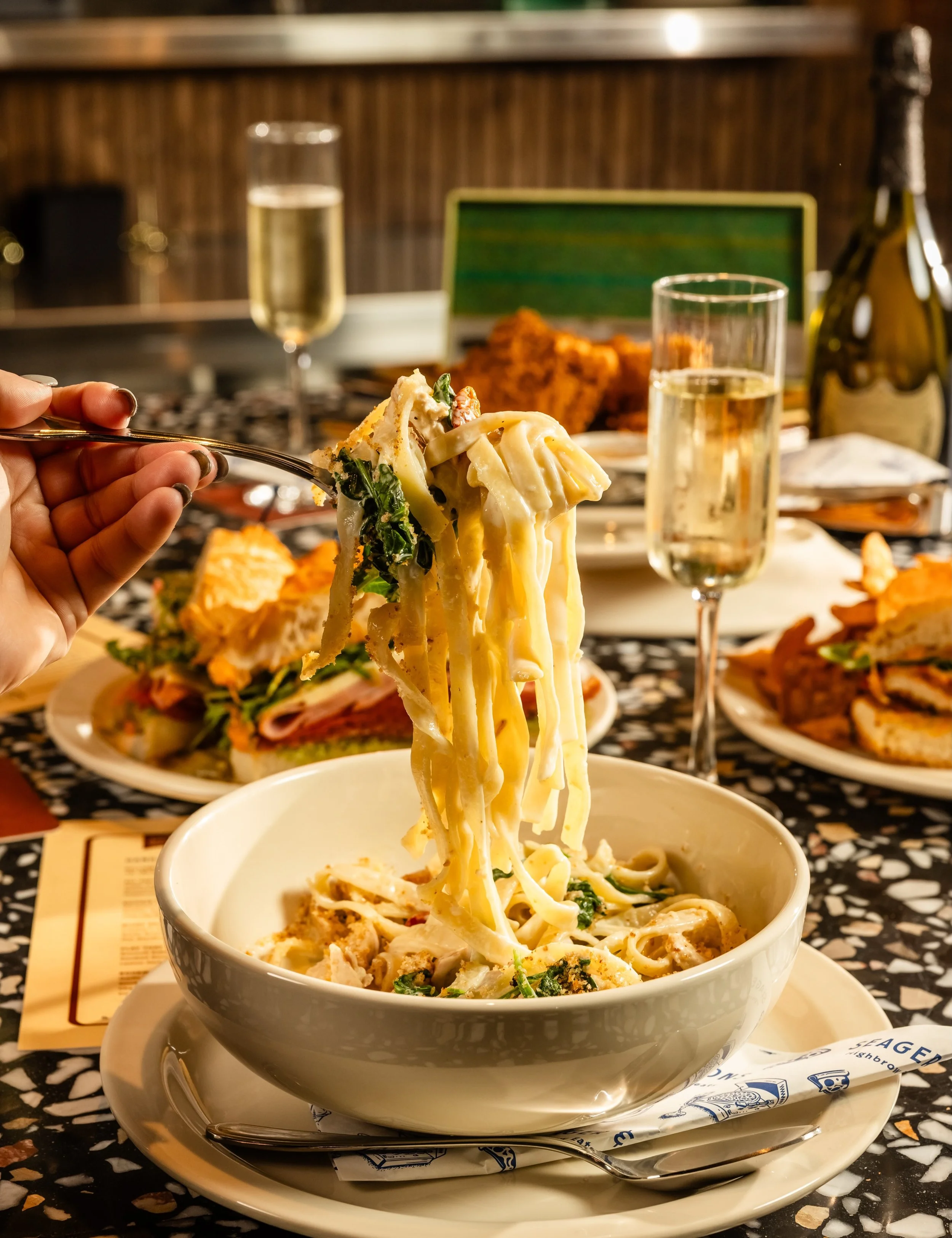 A little sophisticated. A lotta indulgent. 

The Highbrow Pasta combines tagliatelle, roasted chicken, garlicky mushrooms, parmesan, oven-dried tomatoes and sweet onion cream sauce. Breadcrumbs on top because apparently we&rsquo;re showing off. Quite