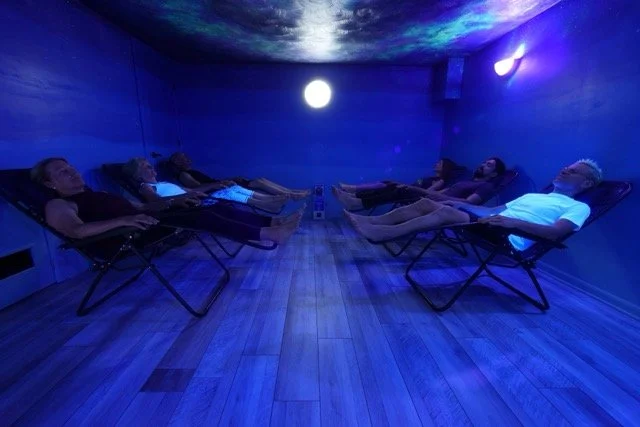 People laying down on a salt therapy room