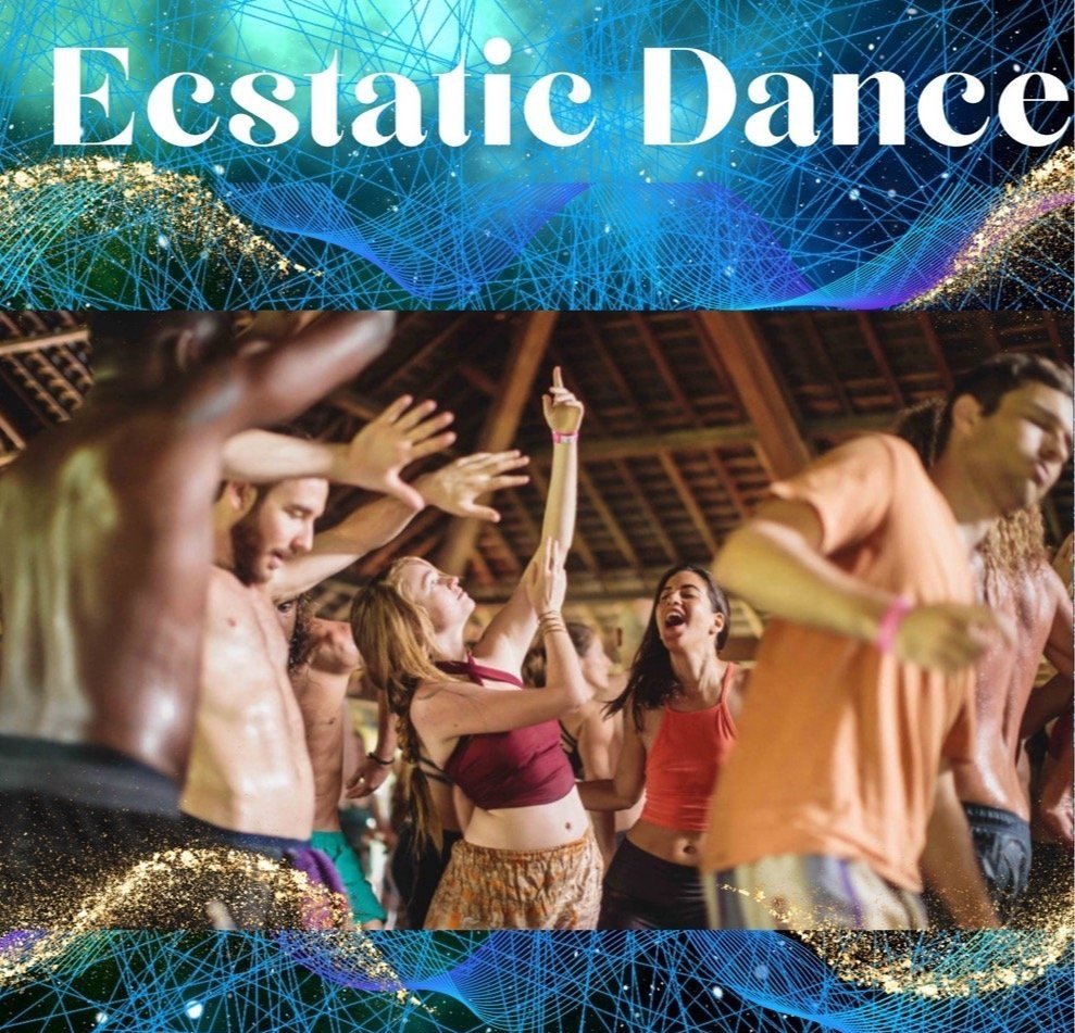 People dancing and celebrating at an indoor event with a wooden ceiling, under a banner that reads 'Ecstatic Dance' with colorful digital graphics.