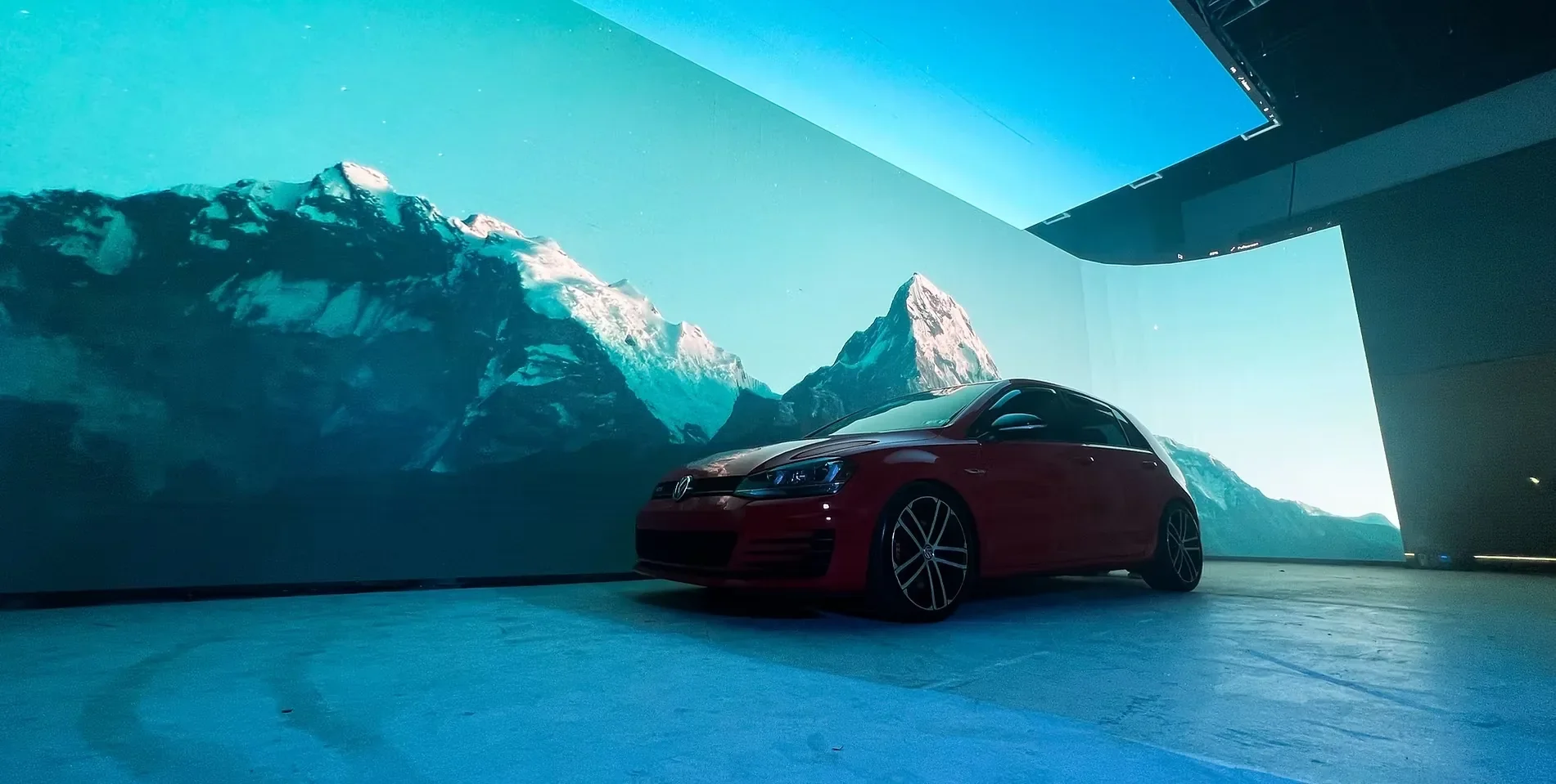 Red Car on a virtual production LED stage displaying a mountain landscape at Jersey Victory Studios.
