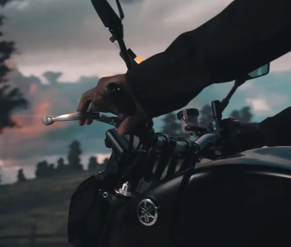 Close-up of a Yamaha motorcycle filmed against a realistic outdoor landscape using LED virtual production technology.