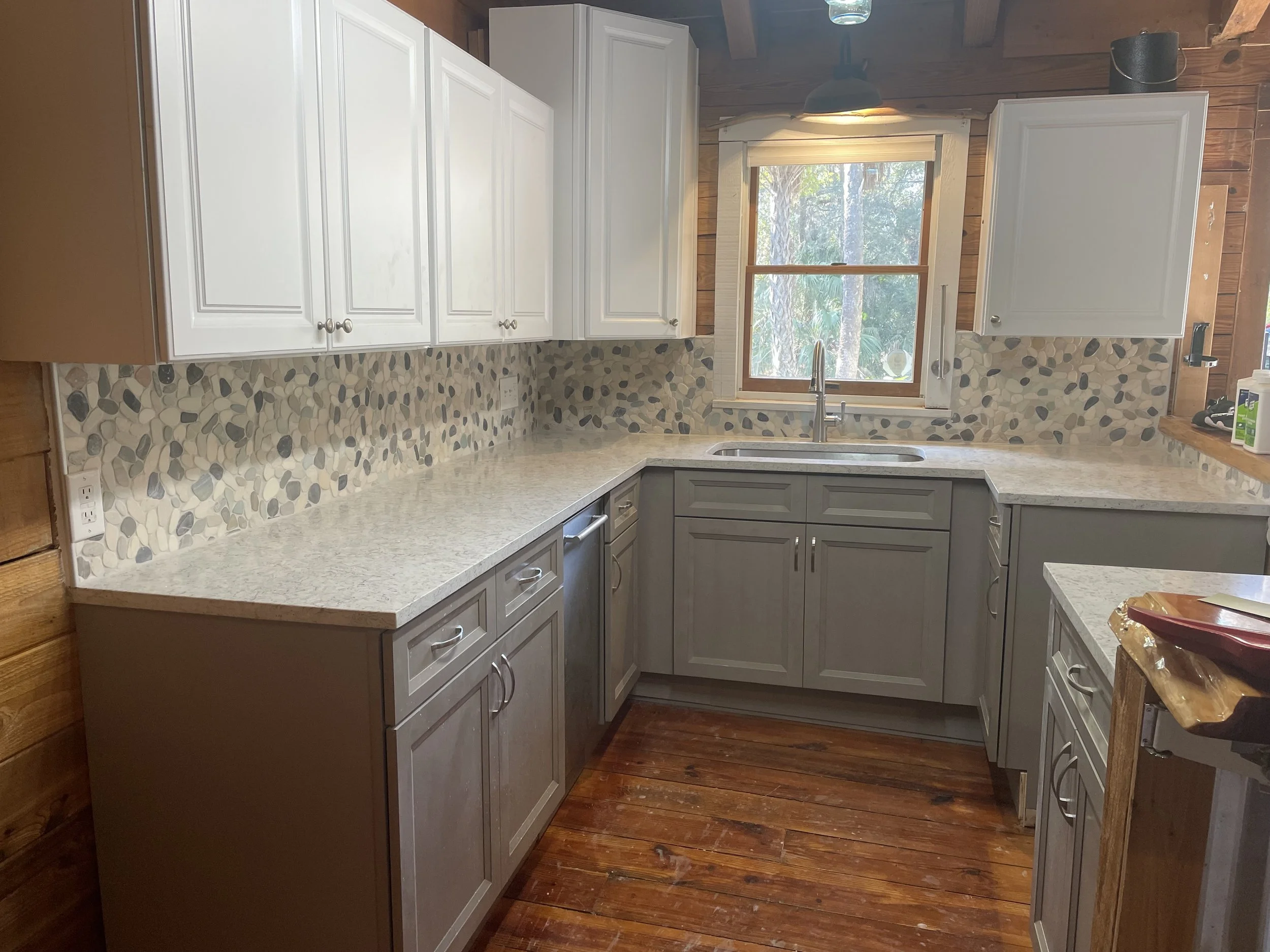 Fixed unleveled cabinetry and installed backsplash tile in Homosassa, FL