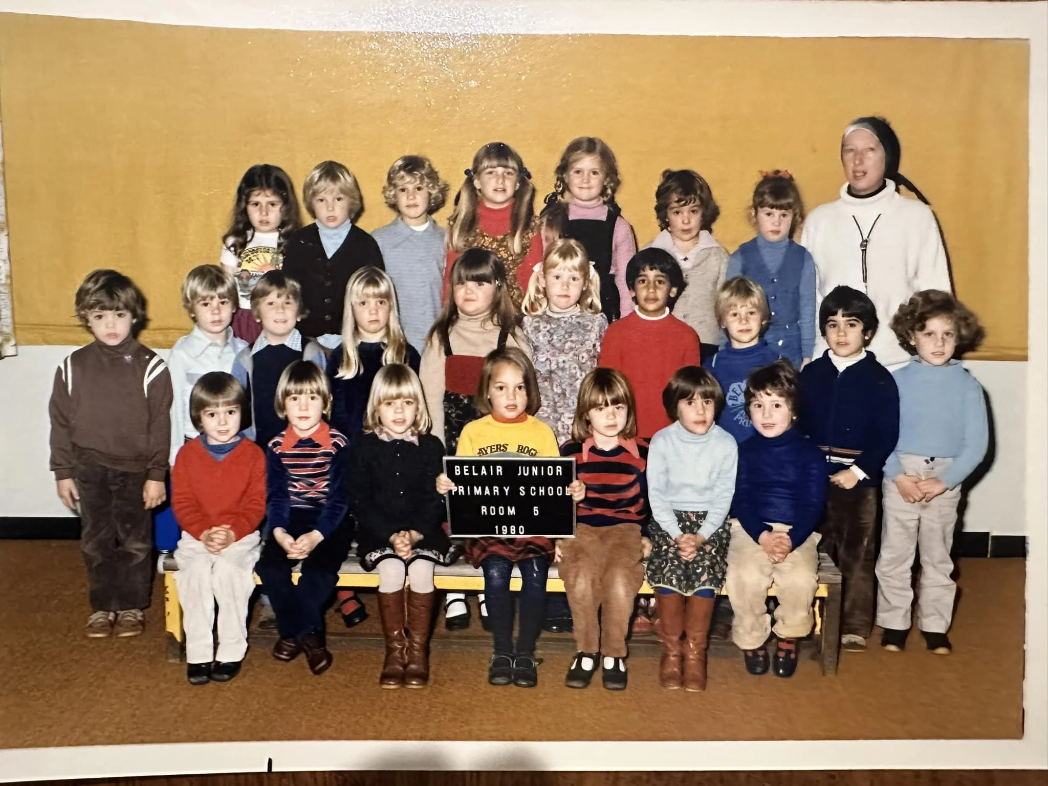 Class photo of young children in a school classroom, with a teacher, dated 1980, in Belair Junior Primary School, Room 5.