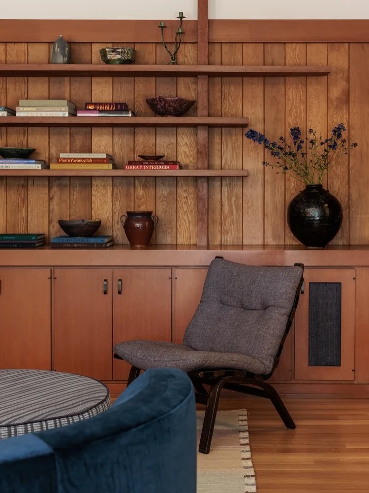 We're absolutely obsessed with heritage homes - from Victorian charm to Mid Century modern vibes. There's something special about preserving the character of a home, like the warmth of original paneling and built-ins in this space. 

Head over to the