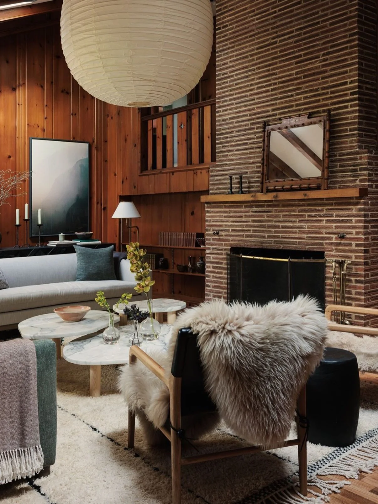 Saving the best for last in our Beaux Arts Village series &mdash; the living room. 🤎

This space is such a testament to the power of good lighting, and finding the right balance of furniture and texture.

We wanted the incredible original details to