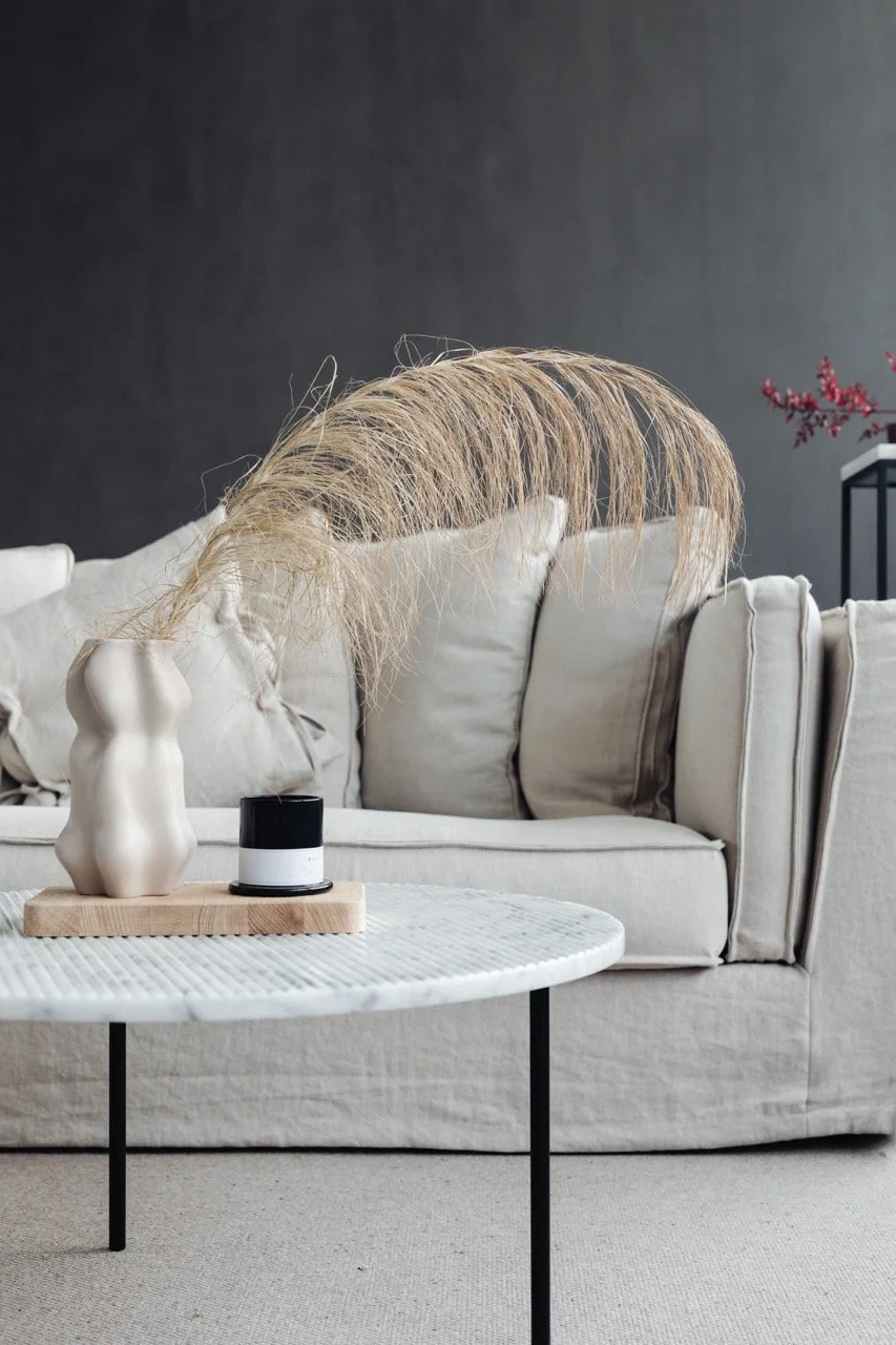 kaboompics_marble-round-table-linen-sofa-beige-living-room-vase-candle-dries-22136 Large.jpeg
