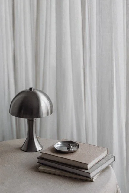 kaboompics_metal-desk-lamp-zara-home-silver-jewelry-linen-tablecloth-books-34279 Medium.jpeg