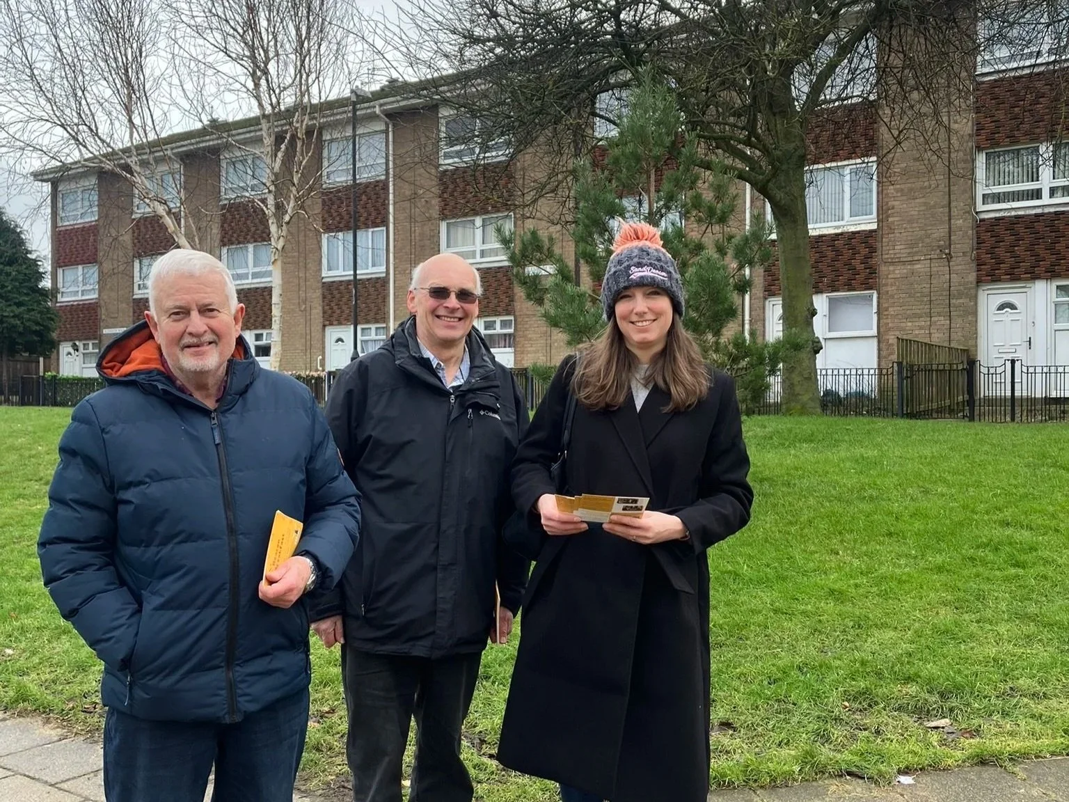 Handing out invites to church