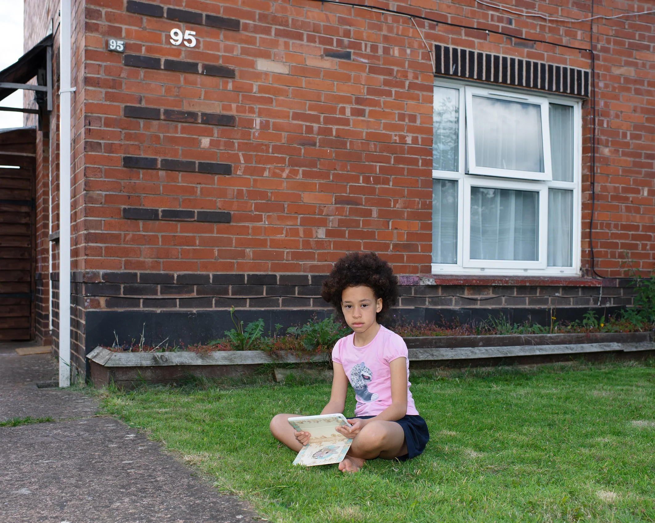 Amber in her front garden