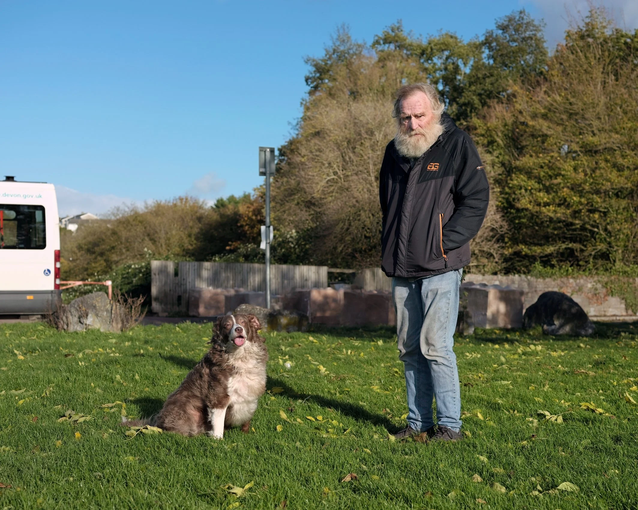Elderly man with his dog, Playing Fields