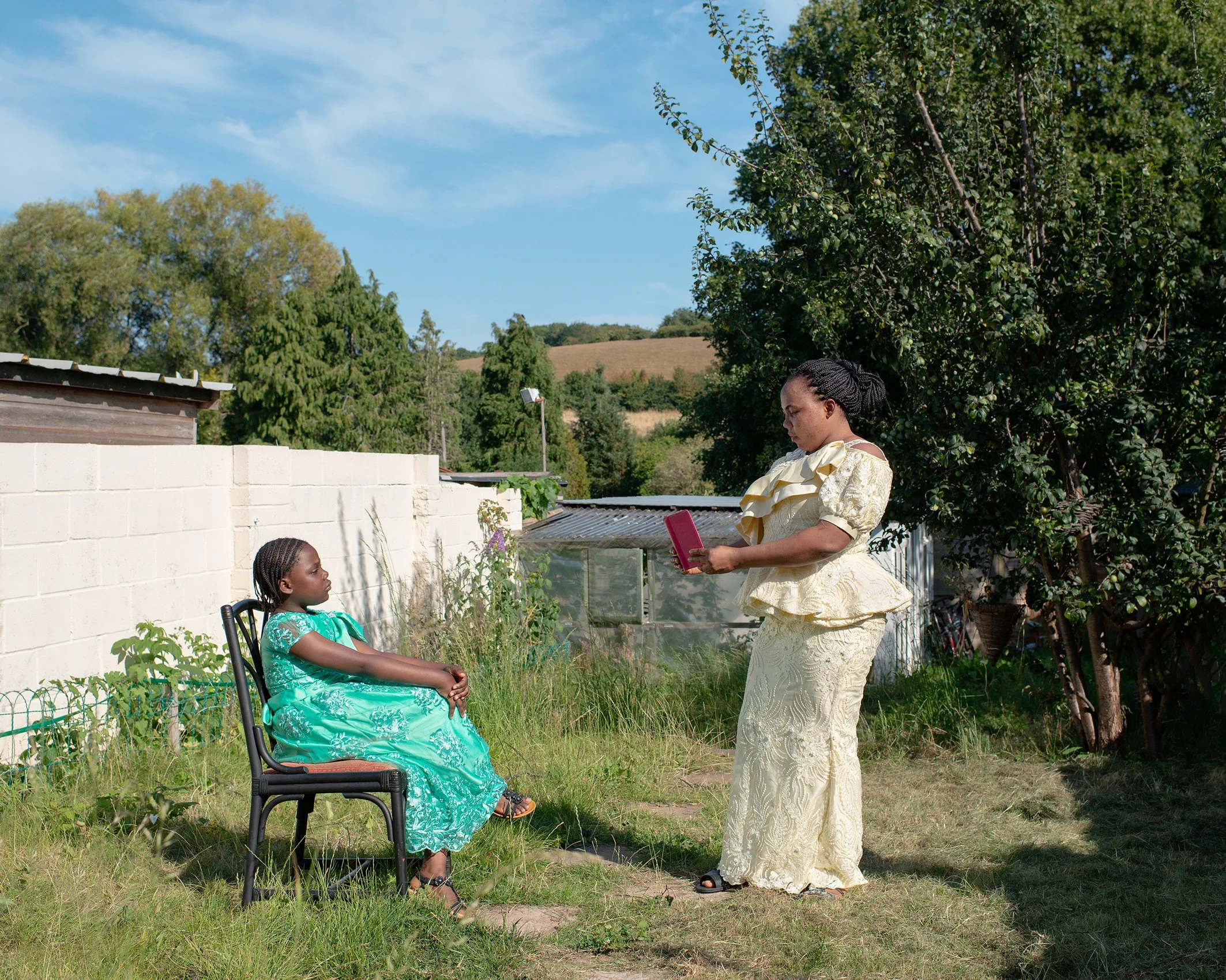 Dorcas and her mother Esther in their back garden
