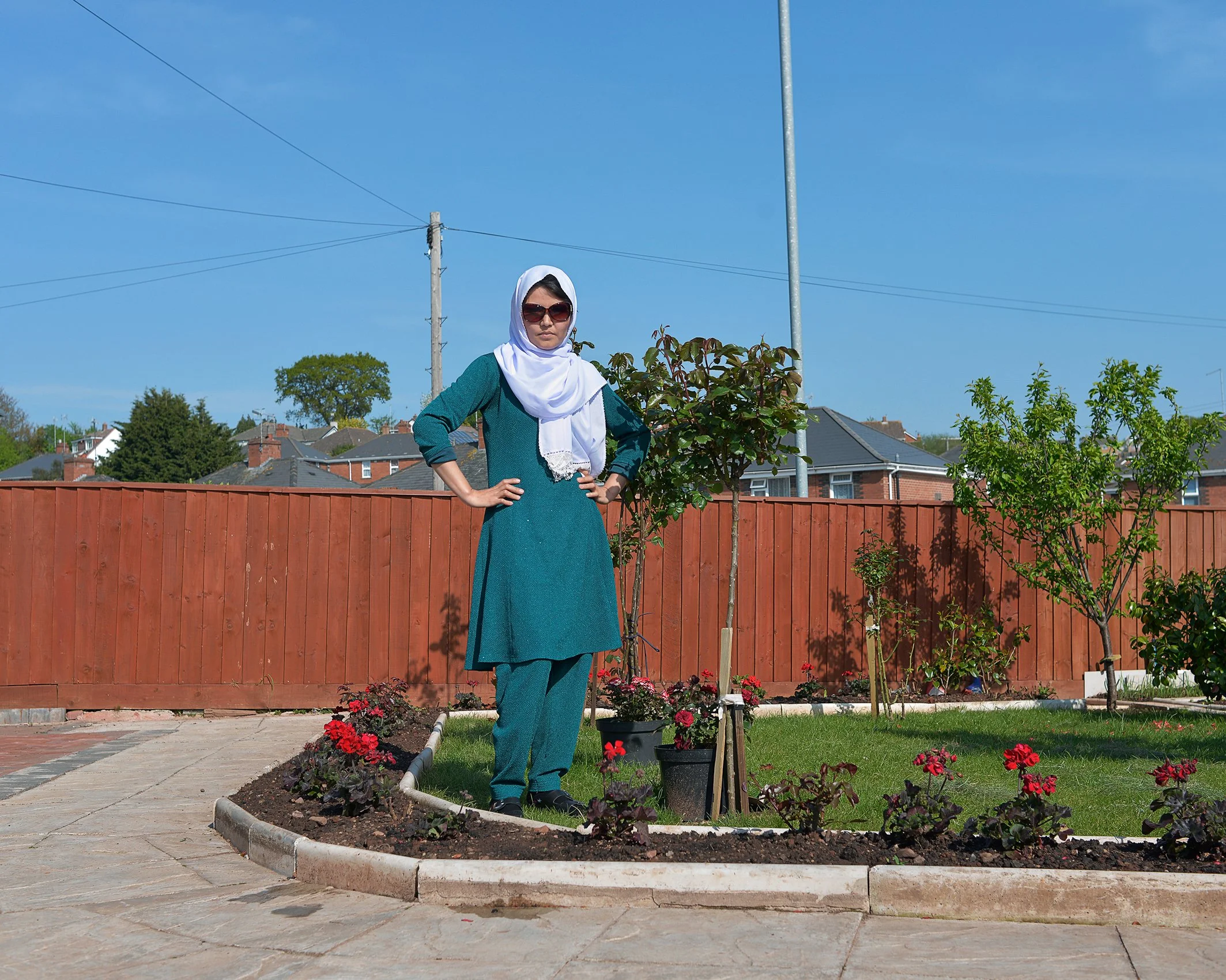 Rahila in her front garden