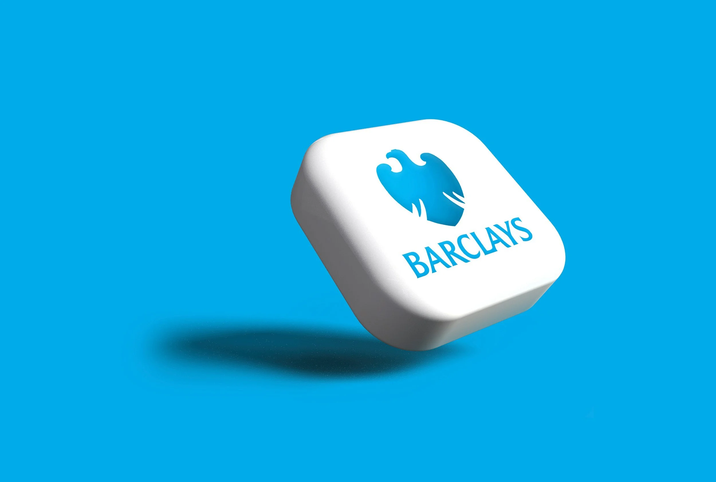 Barclays logo on a white block with a blue background.