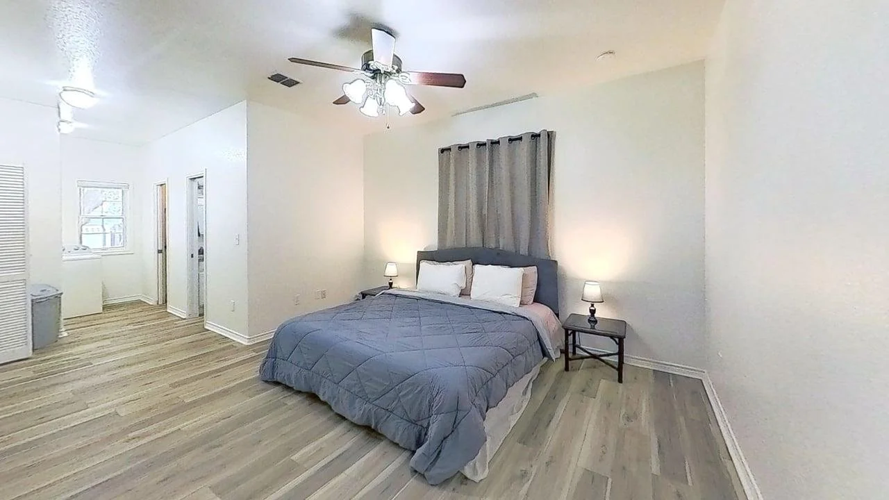 433-W-San-Antonio-St-Bluebonnet-Bedroom.jpg