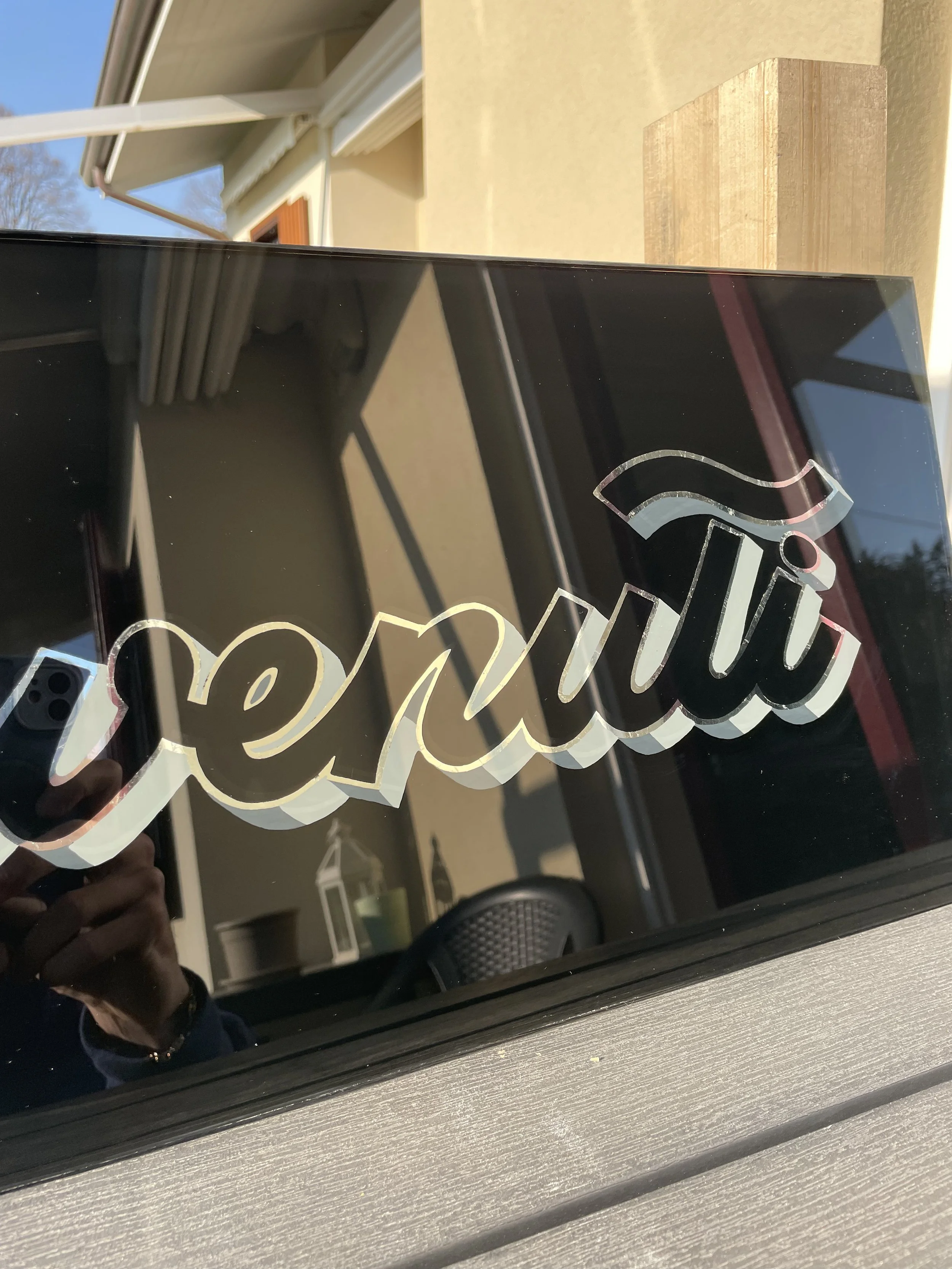 benvenuti glass sign