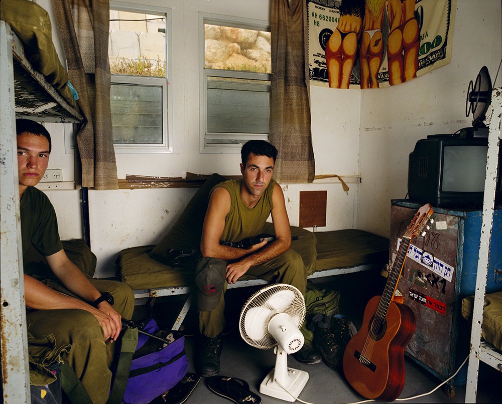Gillian Laub Ben and Gil on a Break, Rosh Hanikra, August, 2004 Chromogenic prints 20 x 24"    Edition of 8 30 x 40"    Edition of 5 40 x 50"    Edition of 3