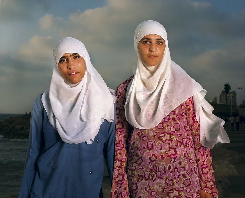 Gillian Laub Warda and Rasha on the Boardwalk, Jaffa, September, 2002 Chromogenic prints 20 x 24"    Edition of 8 30 x 40"    Edition of 5 40 x 50"    Edition of 3