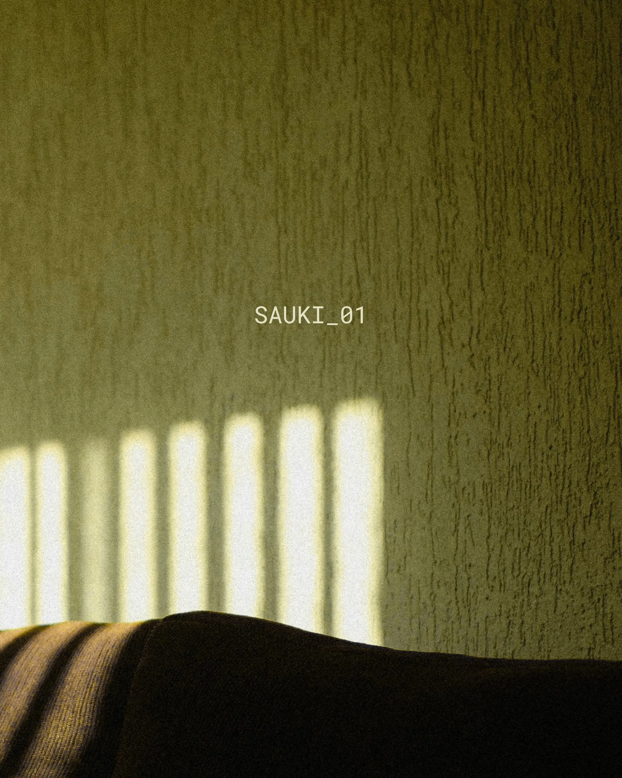 SAUKI_01 
A study in contrast, texture and line. 
Two distinct textiles come together through a restrained composition, punctuated by a single embroidered line. 
Each piece is individually handcrafted and numbered in a limited edition of 18. 
Availab