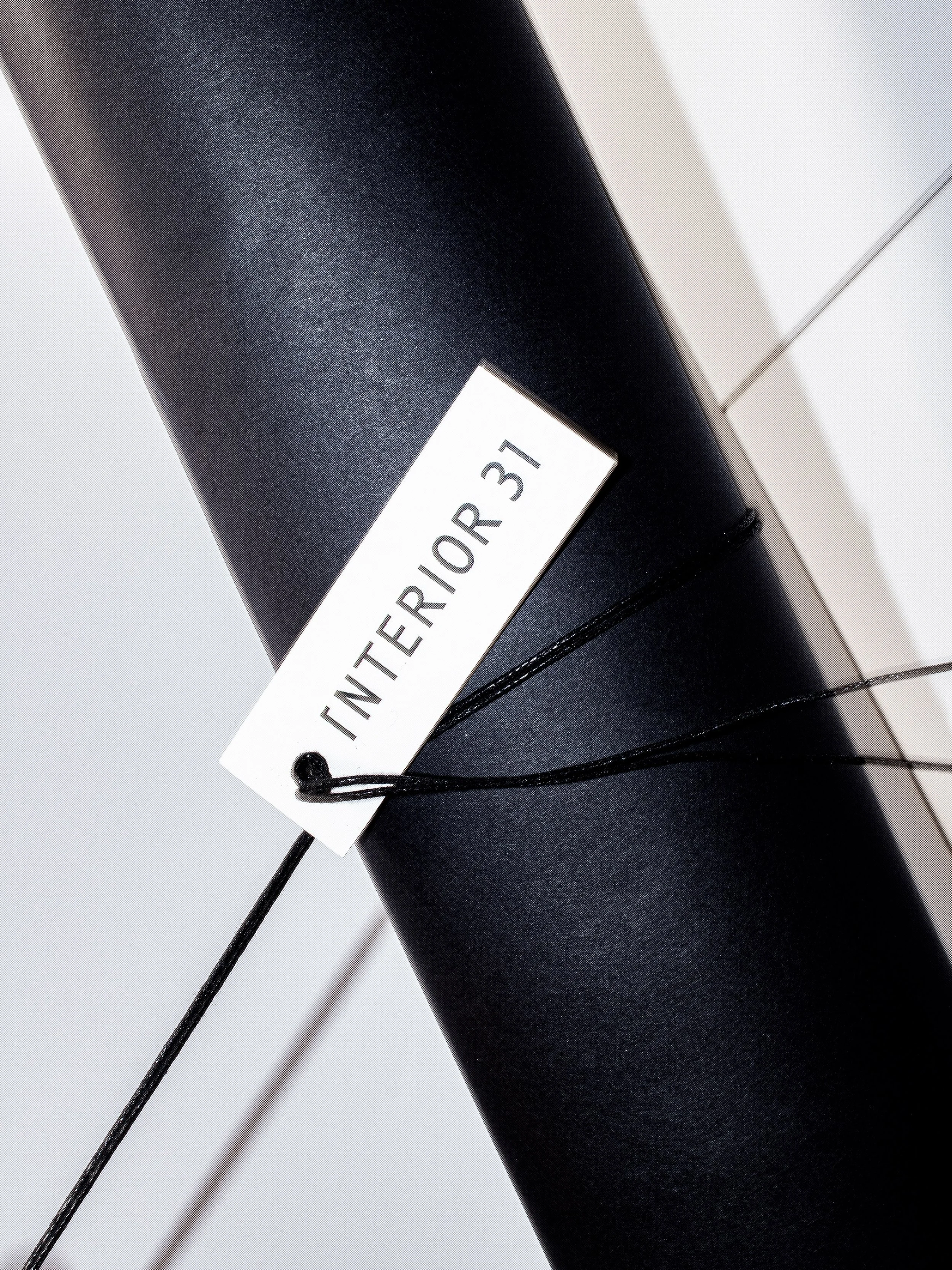 Object &rarr; wrapped &rarr; carried.

Studies in paper, cord and presentation.