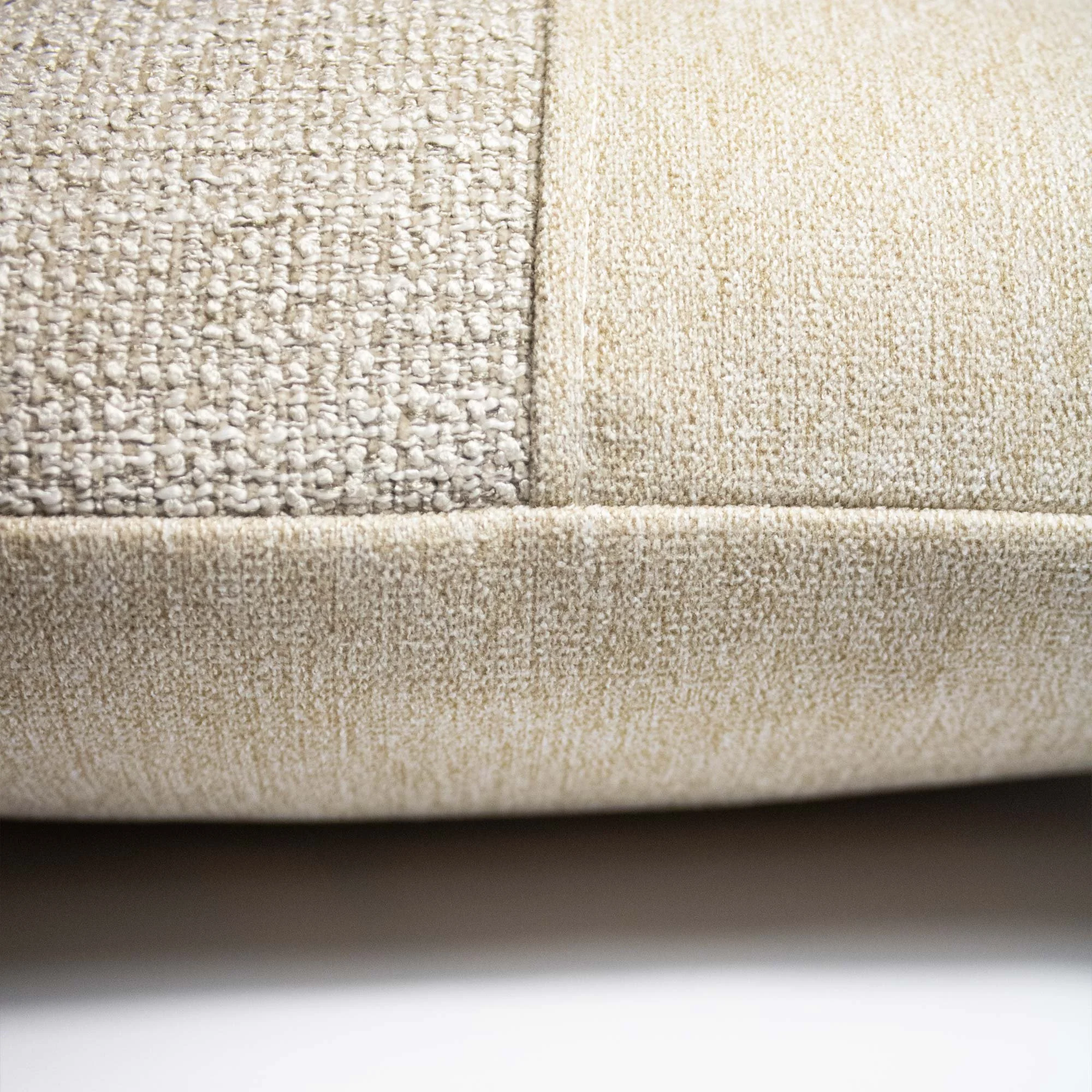 NASARA_03 decorative cushion in beige textile with brown leather panel and vertical seafoam stitched detail