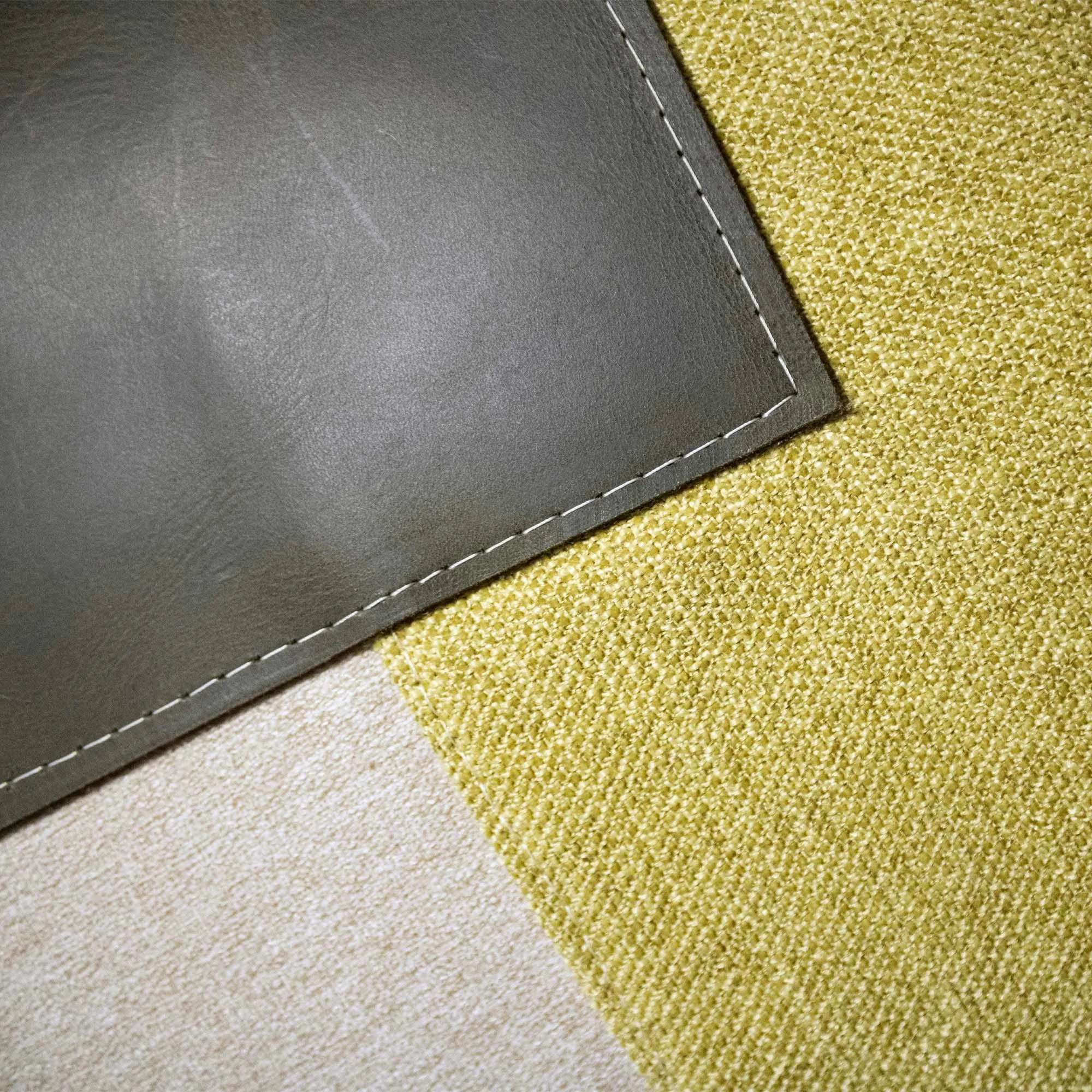ELAMA_02 decorative cushion in beige and pistachio green textile with central forest green leather panel and white stitched white line detail