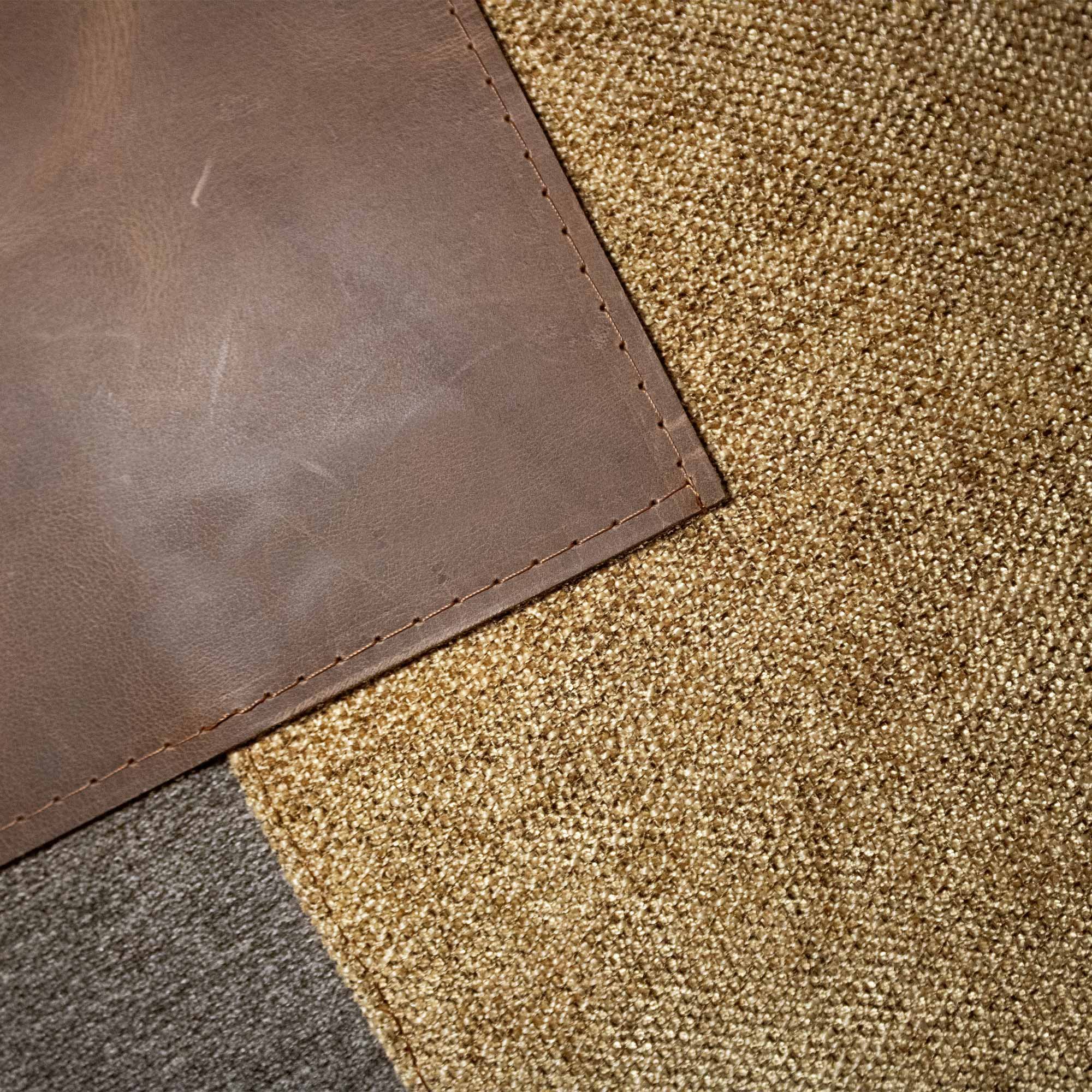 ELAMA_03 decorative cushion in dark brown and sepia textile with central brown leather panel and rust brown stitched line detail