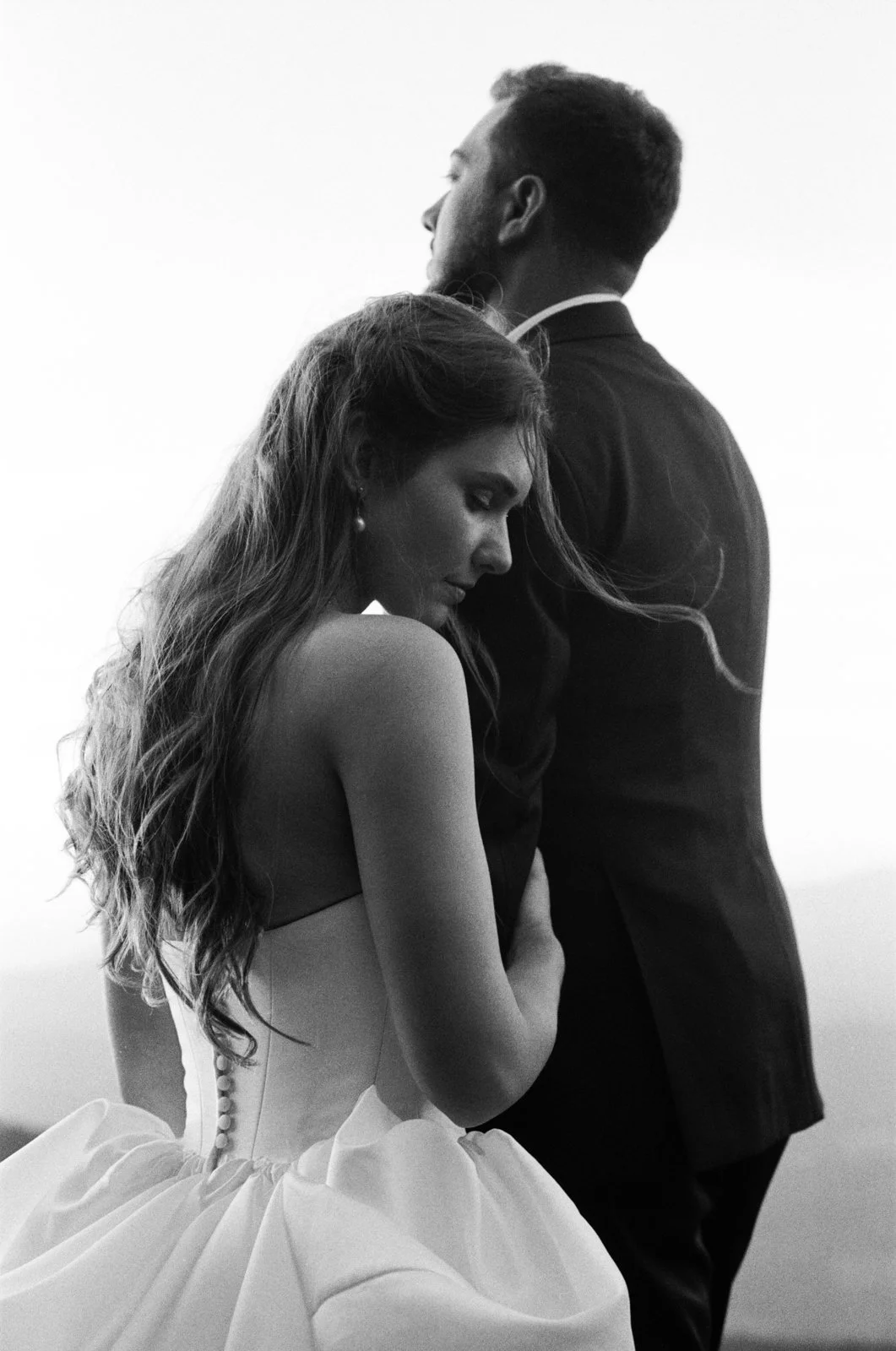 Bride and groom portrait on black and white film