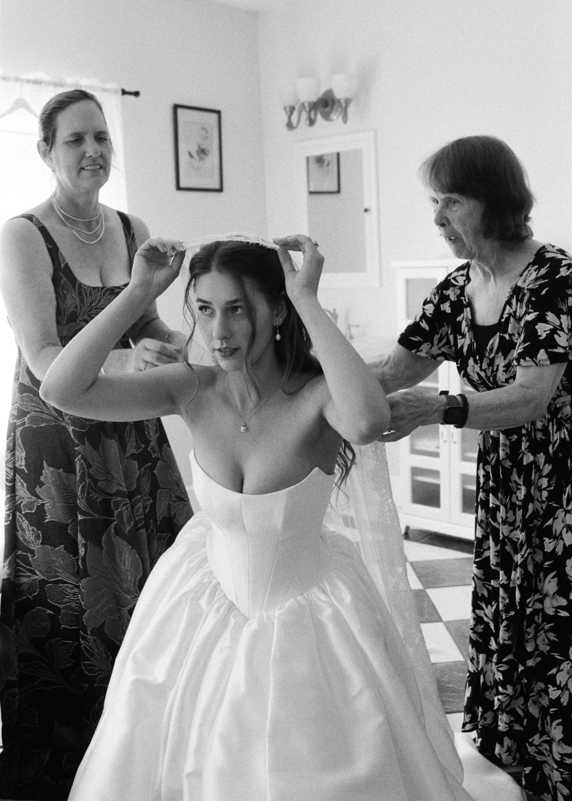 Bride getting ready on black and white film