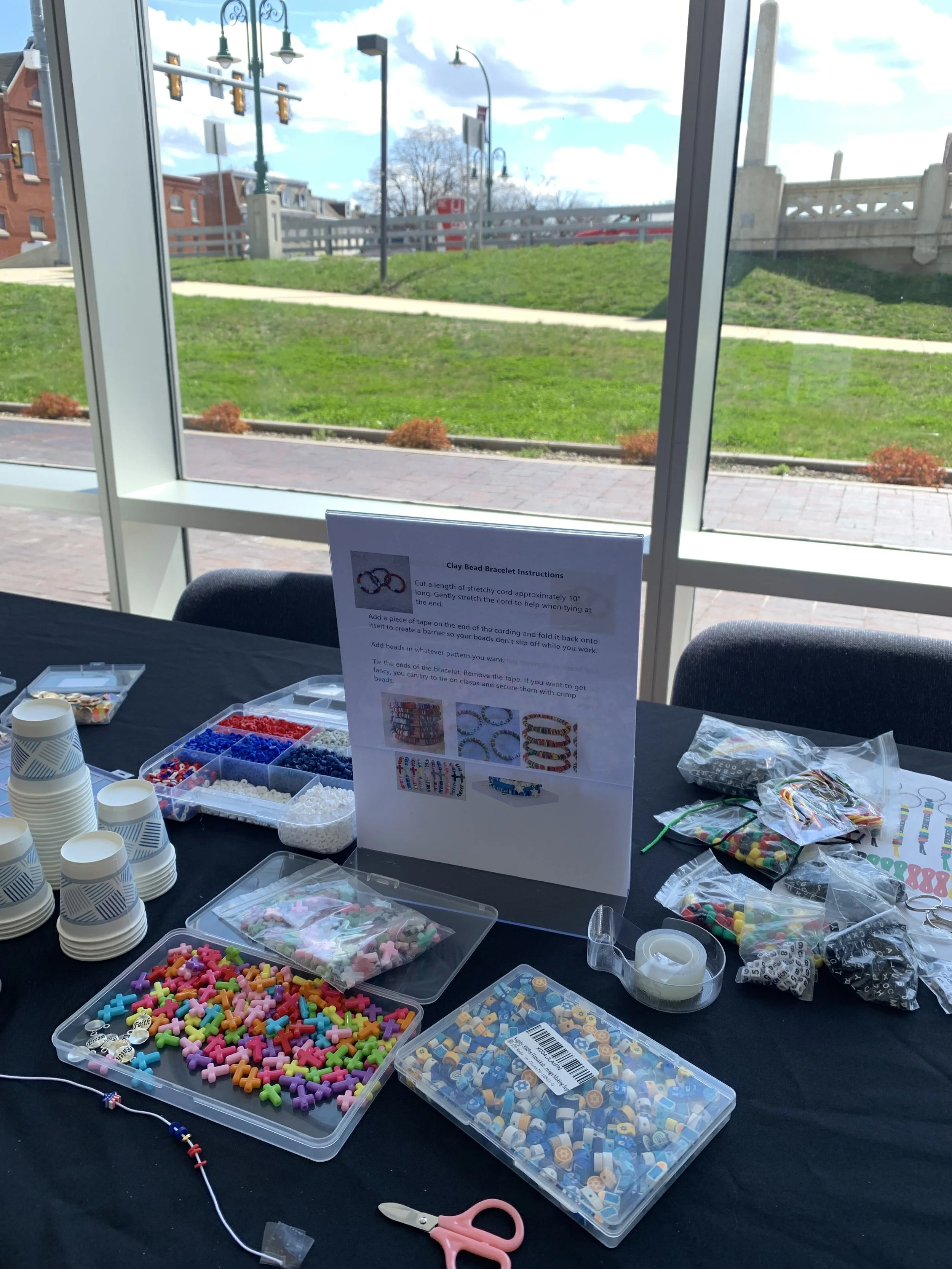 friendship bracelet supplies on a table
