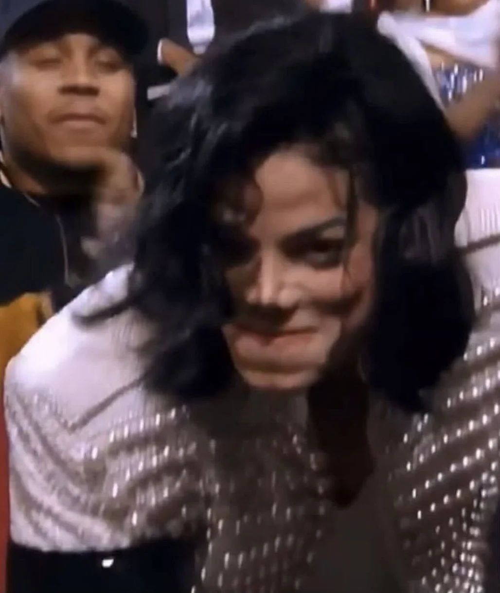 Michael Jackson with LL Cool J in the background
