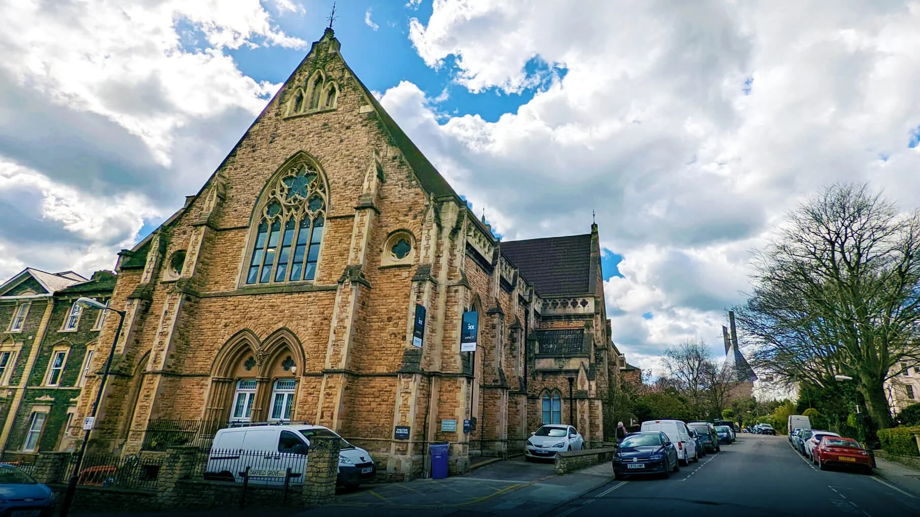 FutureLeap co-working offices with a Voqa EV Charger on a converted church or school building on a Bristol street