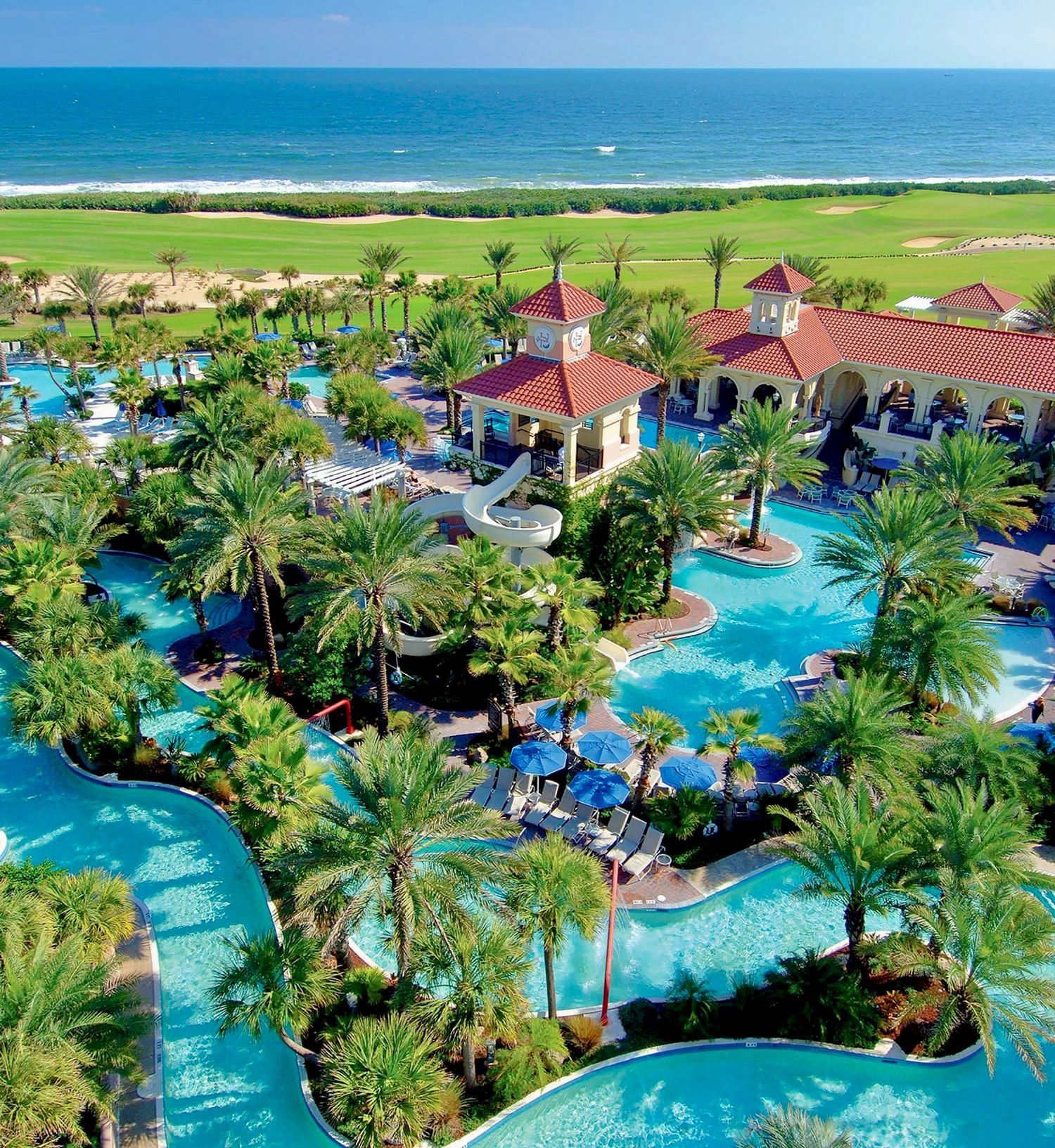 Oceanfront resort pool at Cinnamon Beach Palm Coast Florida with tropical landscaping
