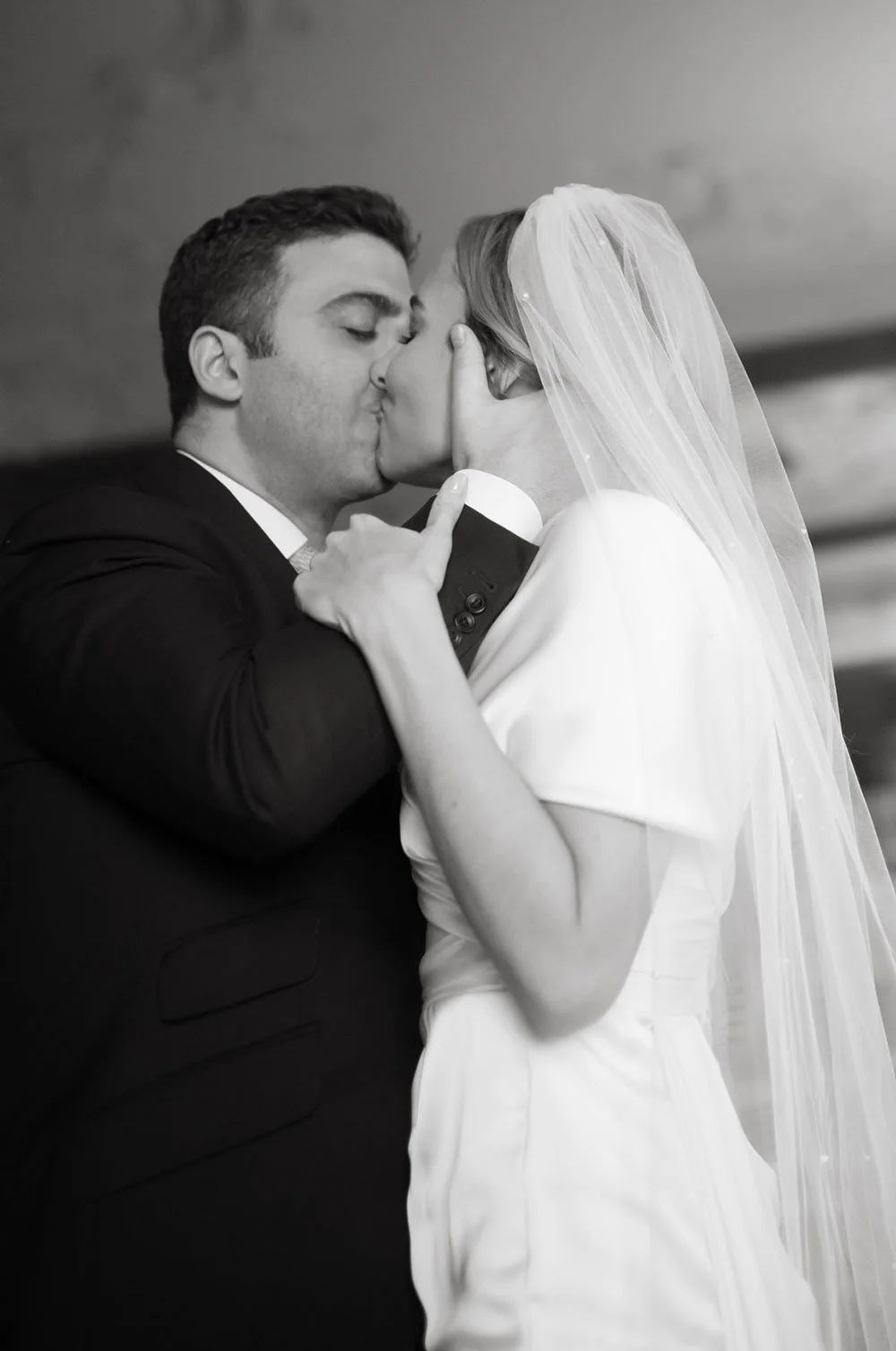 First kiss as a married couple at Zunfthaus zur Meisen in Zurich, Switzerland