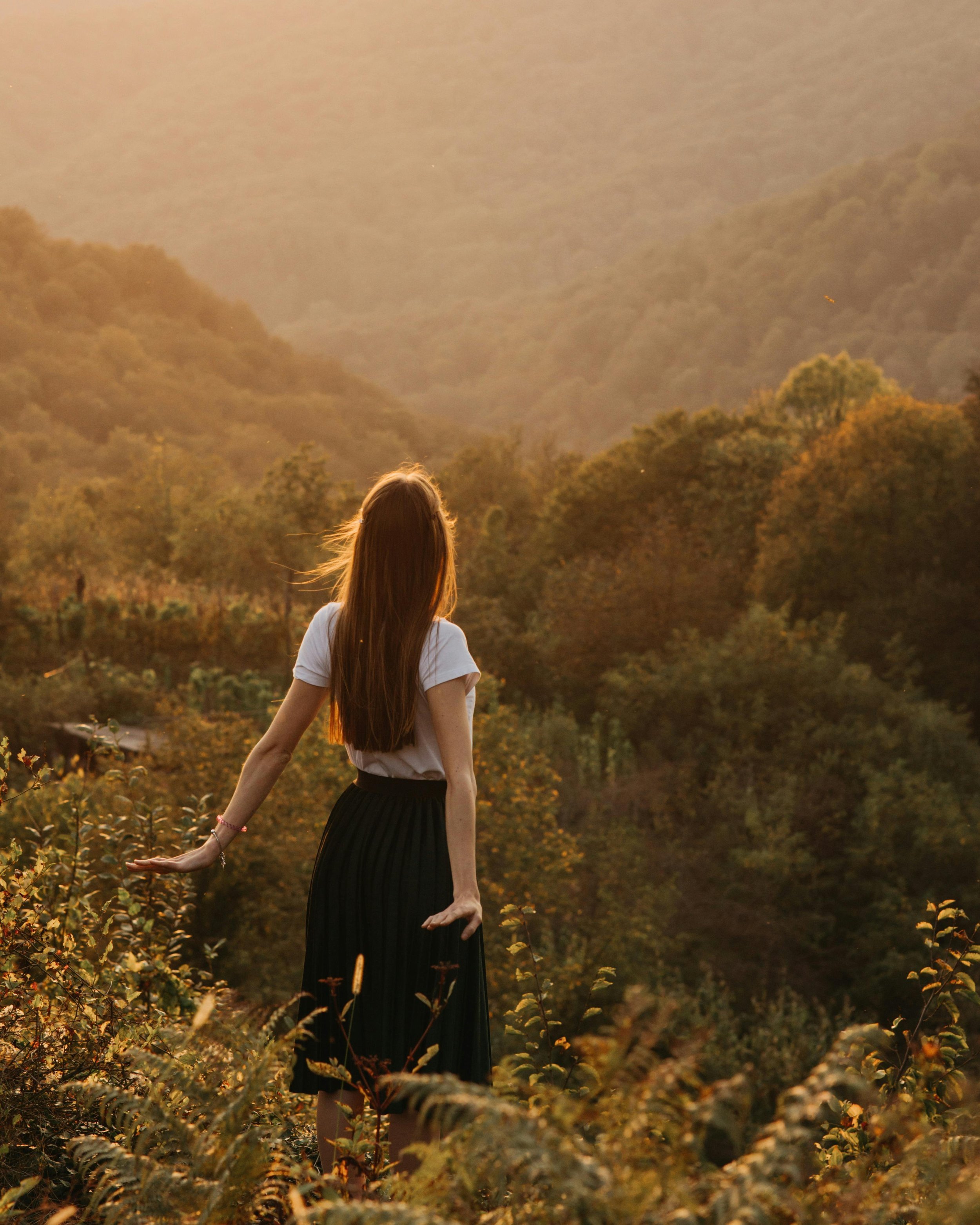 woman+in+bright+nature+scene.jpeg