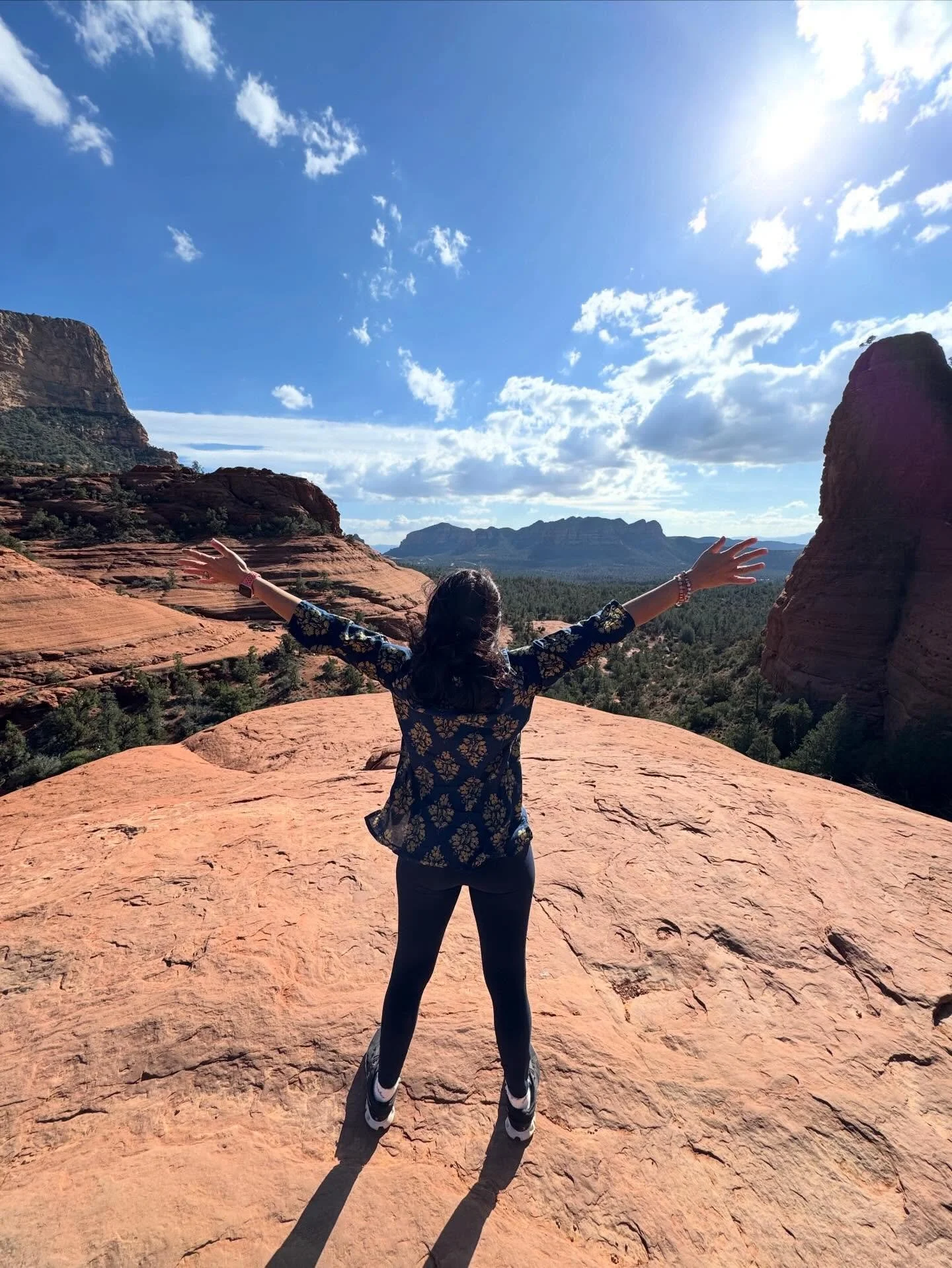 On International Women&rsquo;s Day, I took this photo at Chicken Point in Sedona while on a Pink Jeep tour with my family as we celebrated my mom&rsquo;s 70th birthday. 🎉 🌵🏜️

Standing there with my arms open to the vast desert sky, I felt a deep 