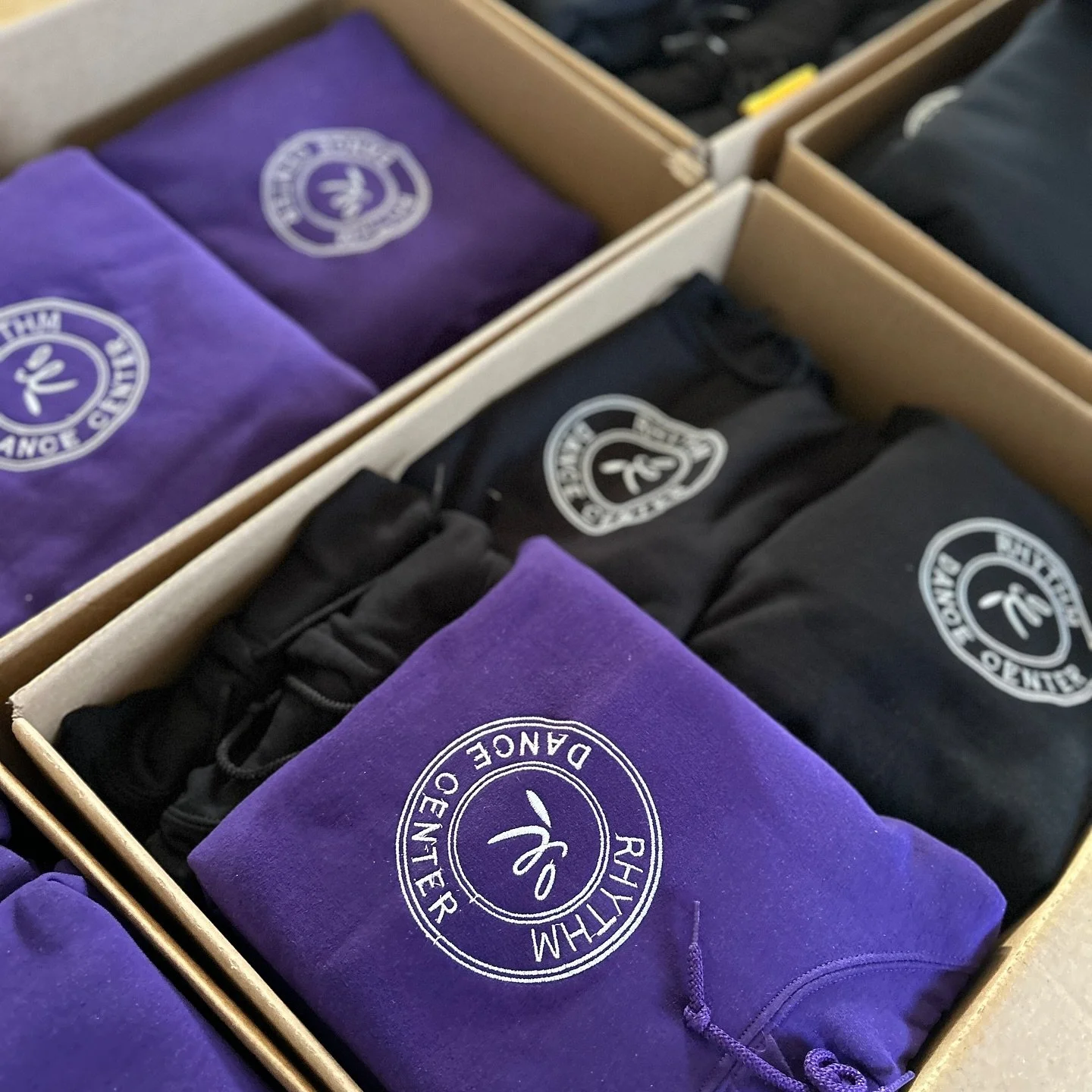 We had the absolute honor of creating custom hoodies for one of the most established &amp; inspiring dance studios in the area! 💜🖤 @rdc_rhythmdancecenter 

Their logo pops beautifully on these purple and black pieces. Thank you for trusting us with