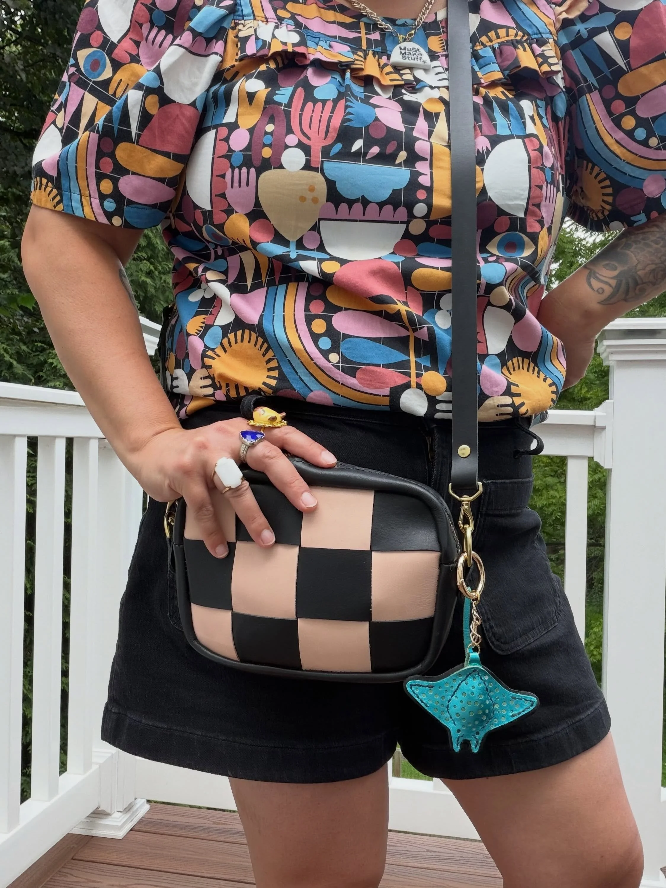 My cousin and I had our own leather bag making workshop a month ago and we both made a woven cross body bag. I had previously made this bag  with 1&rdquo; woven pieces if you look further down in my grid. This time around I used 2&rdquo; woven pieces