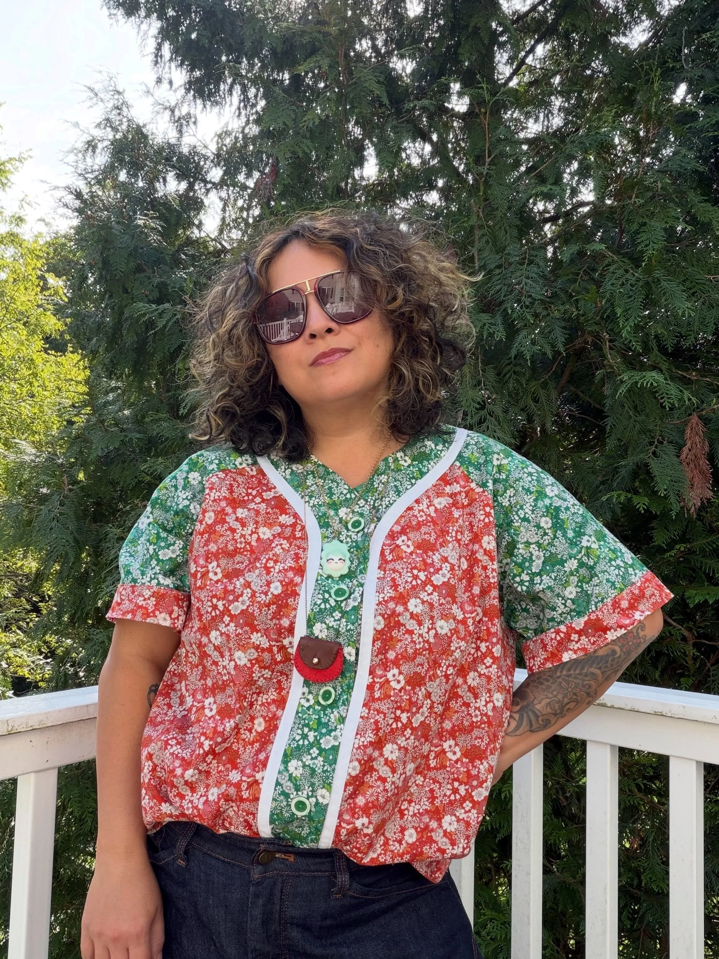 I wanted to try to make this top as soon as the pattern was released. As a high school softball player and the mother of a softball player, it just called to me. I went with a super cute floral print that came in two colors to do a little print color