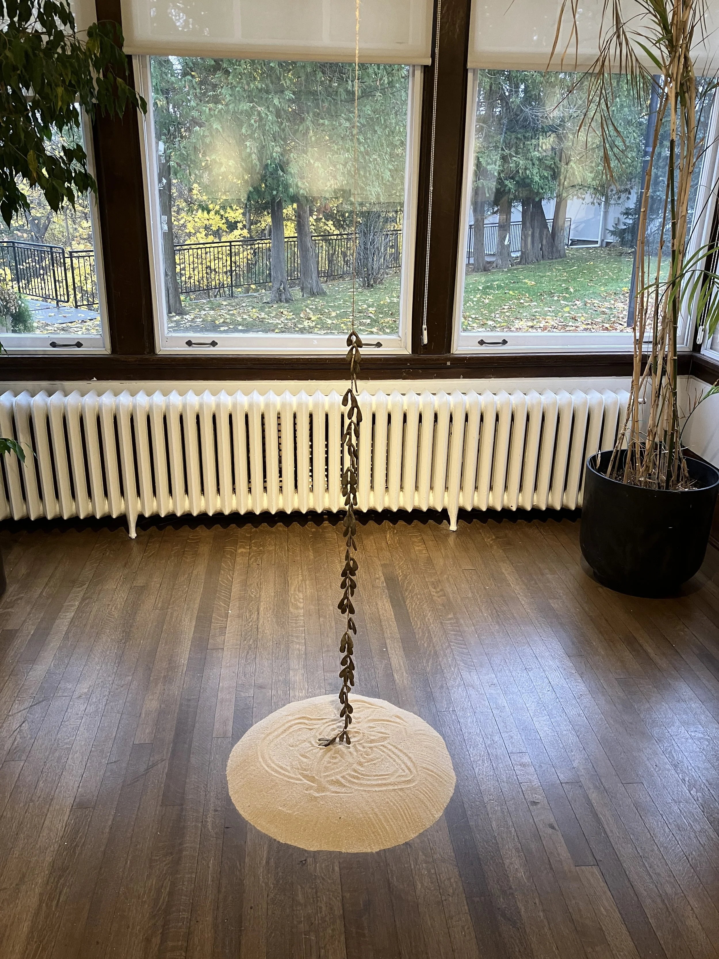 Even As The Dust Moves, (Aspect I) 2023.
Bronze, jute string, copper coloured wire, sand, installation variable. 
Installed at Cedar Ridge Creative Centre