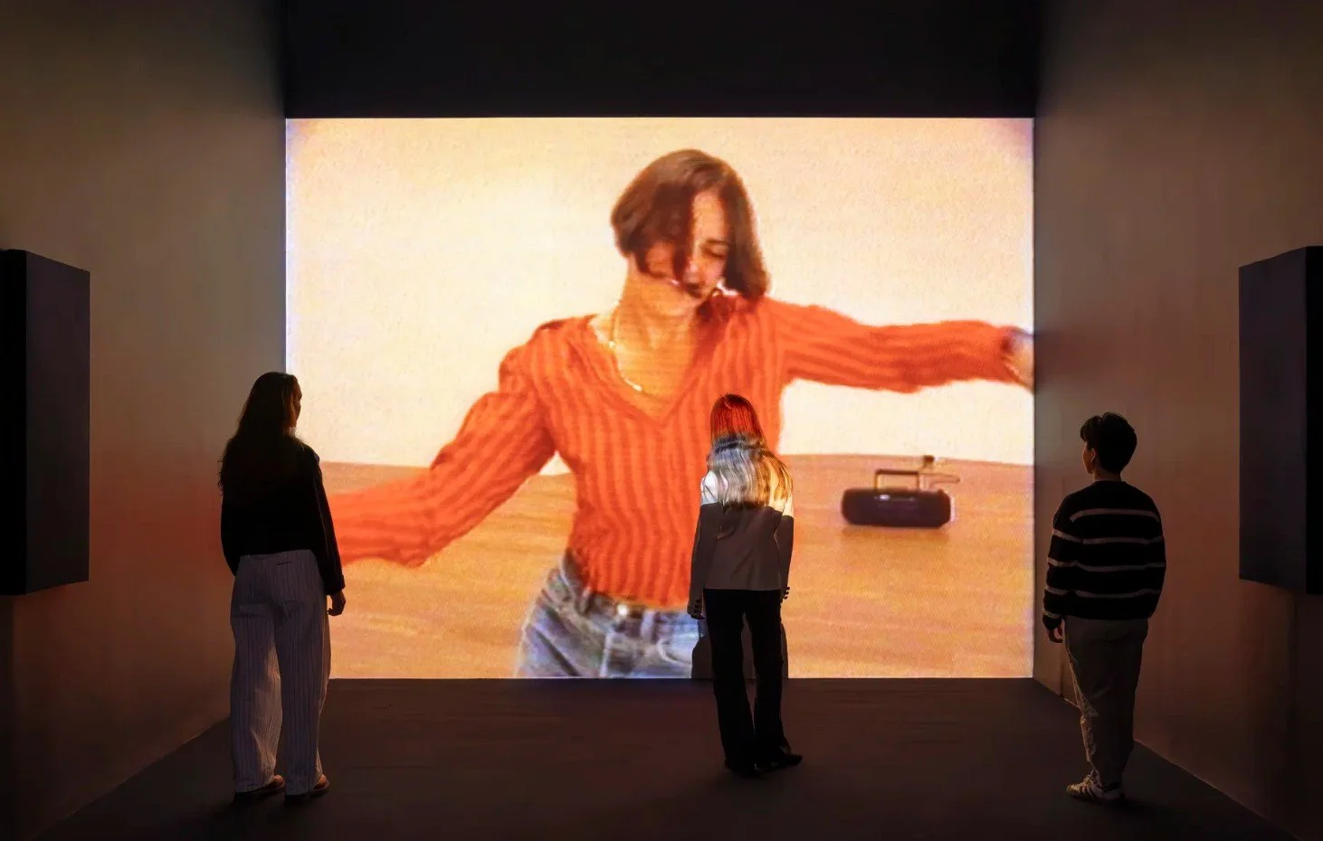 large-scale projection of Tracy Emin in Why I Never Became a Dancer, 1995