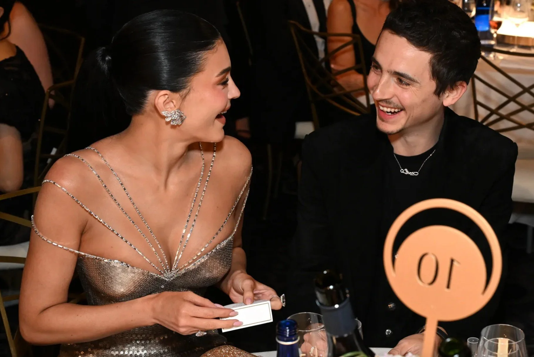 Timothée- Chalamet looking at Kyle-Jenner