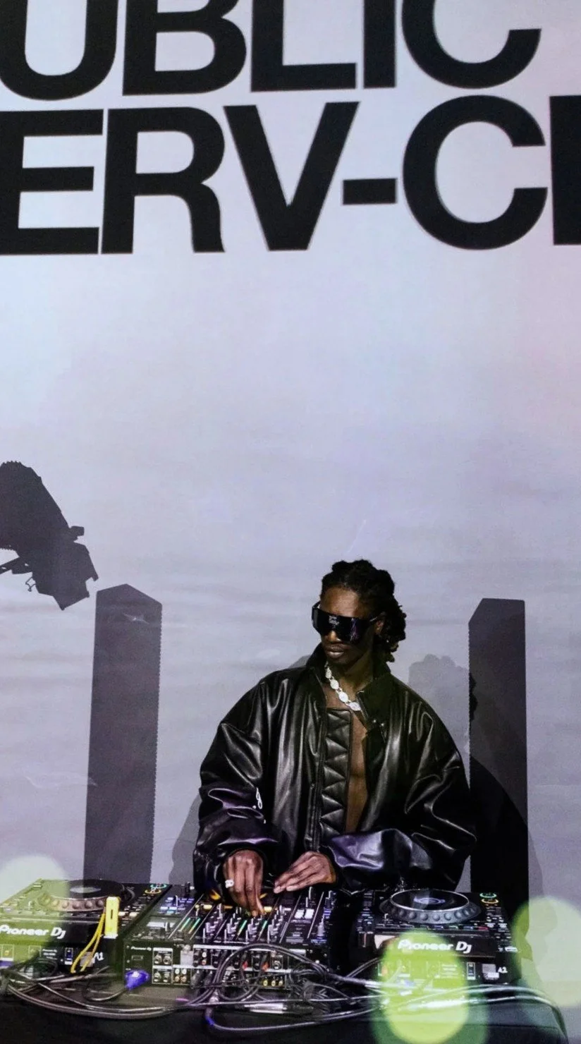 Model on the runway in Raphael Young's The Rest Is Noise SS27 collection for House of Public Serv-ce at New York Fashion Week and JNR CHOI as a DJ