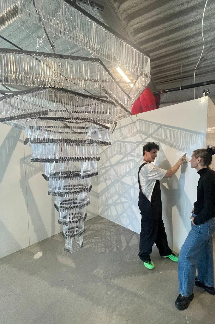 Marcus Magnanni Studio visit At Silver Art Project in front of Razor Blade Chandelier