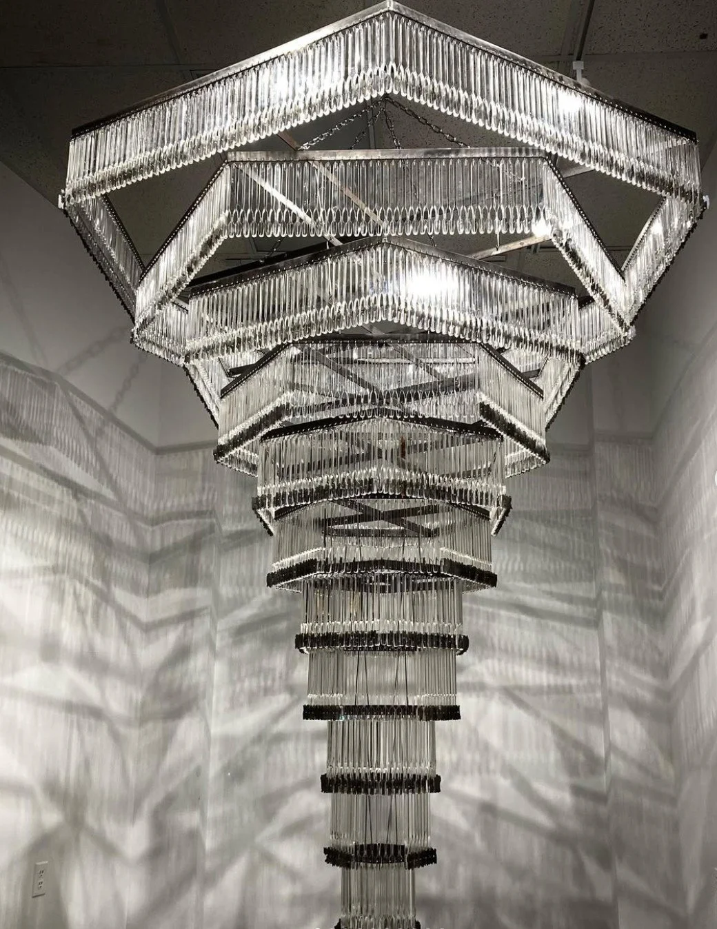 Marcus Manganni razor blade chandelier installation at Silver Art Projects World Trade Center New York 2025