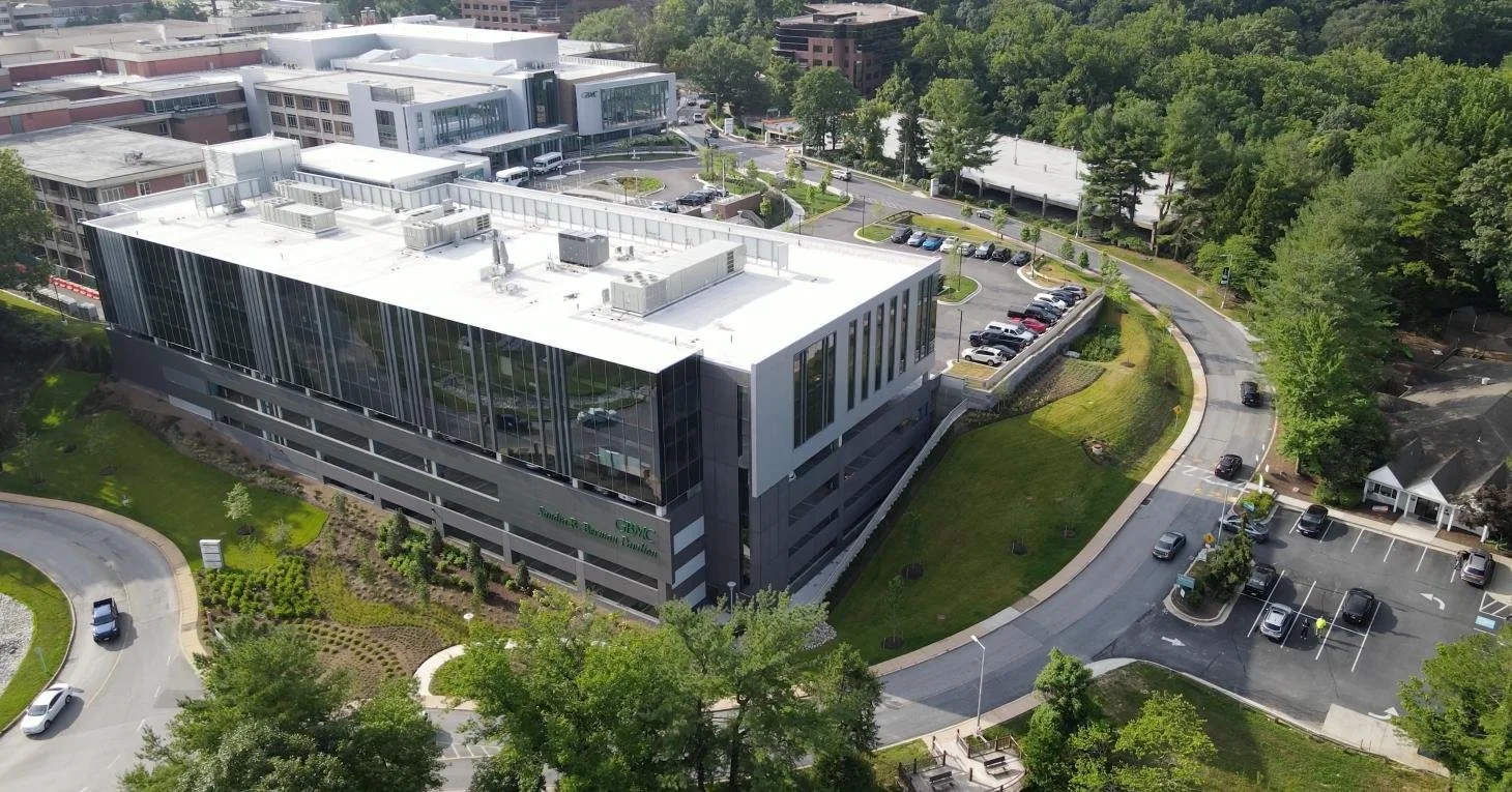 Landscape transformation at Greater Baltimore Medical Center featuring pavers, native plantings, and sustainable stormwater management