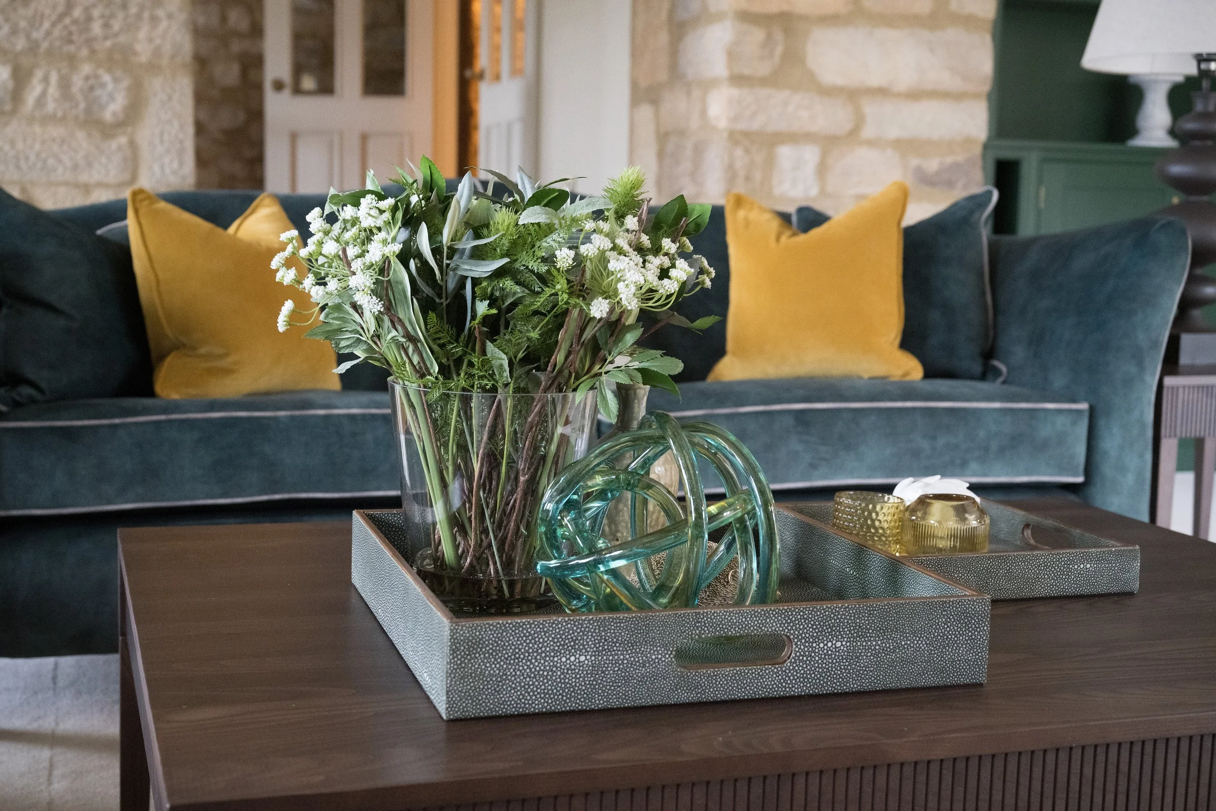 Interior styling for Residential Properties by StyleSmith Interiors featuring fresh flowers, decorative accessories and layered textures in a luxury Yorkshire home