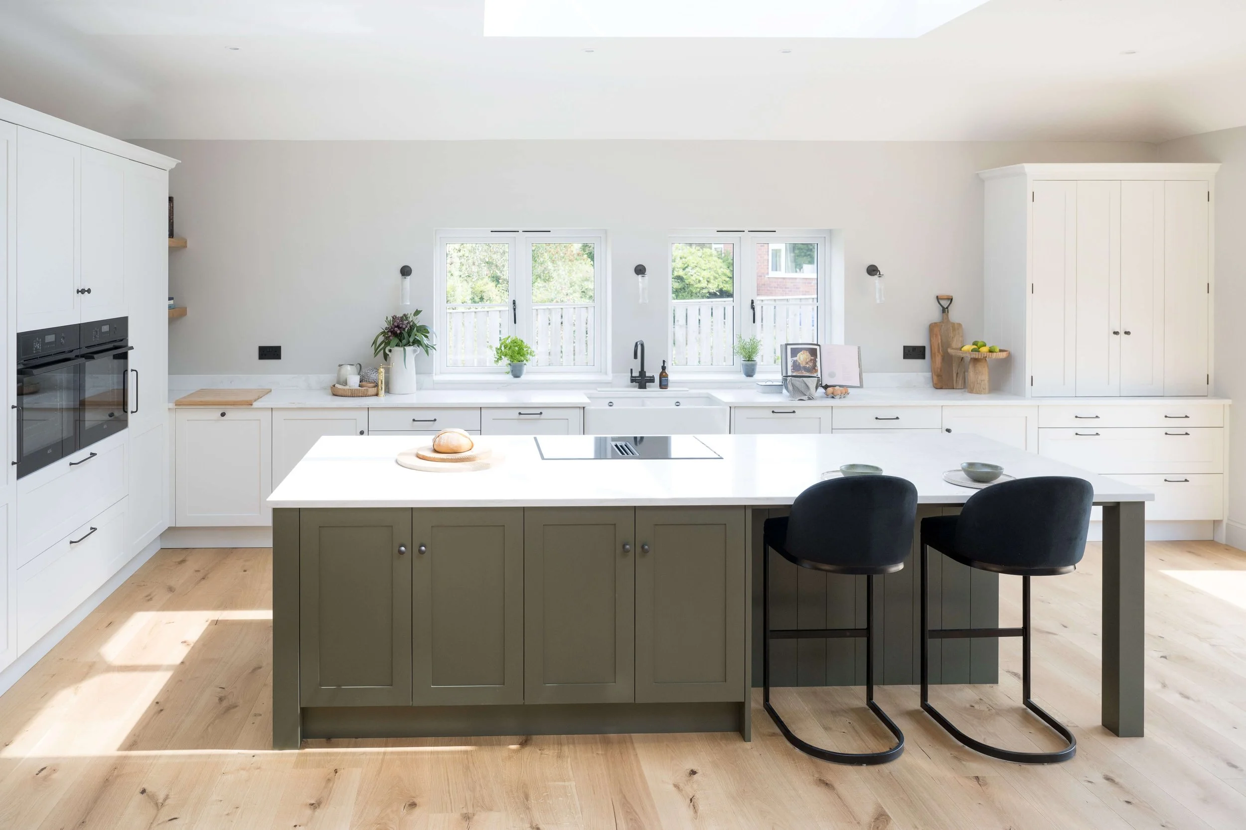 Bright open-plan kitchen and living space designed by StyleSmith Interiors with a bespoke island, serving clients in Harrogate, Leeds, York and throughout Yorkshire