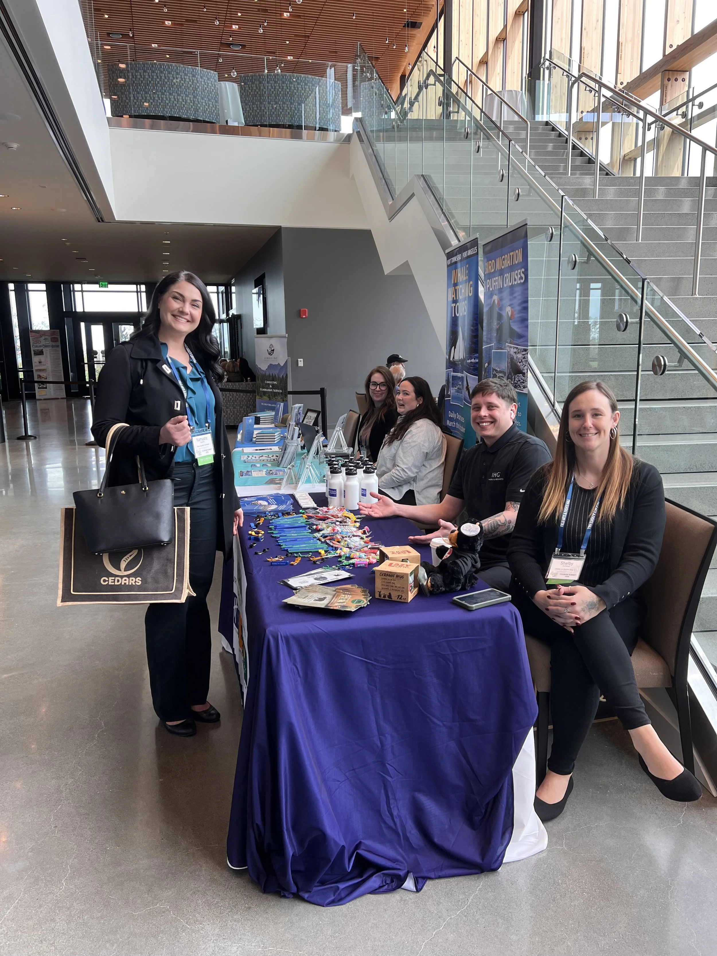 2026-OP Tourism Summit-Sponsors getting ready.jpeg