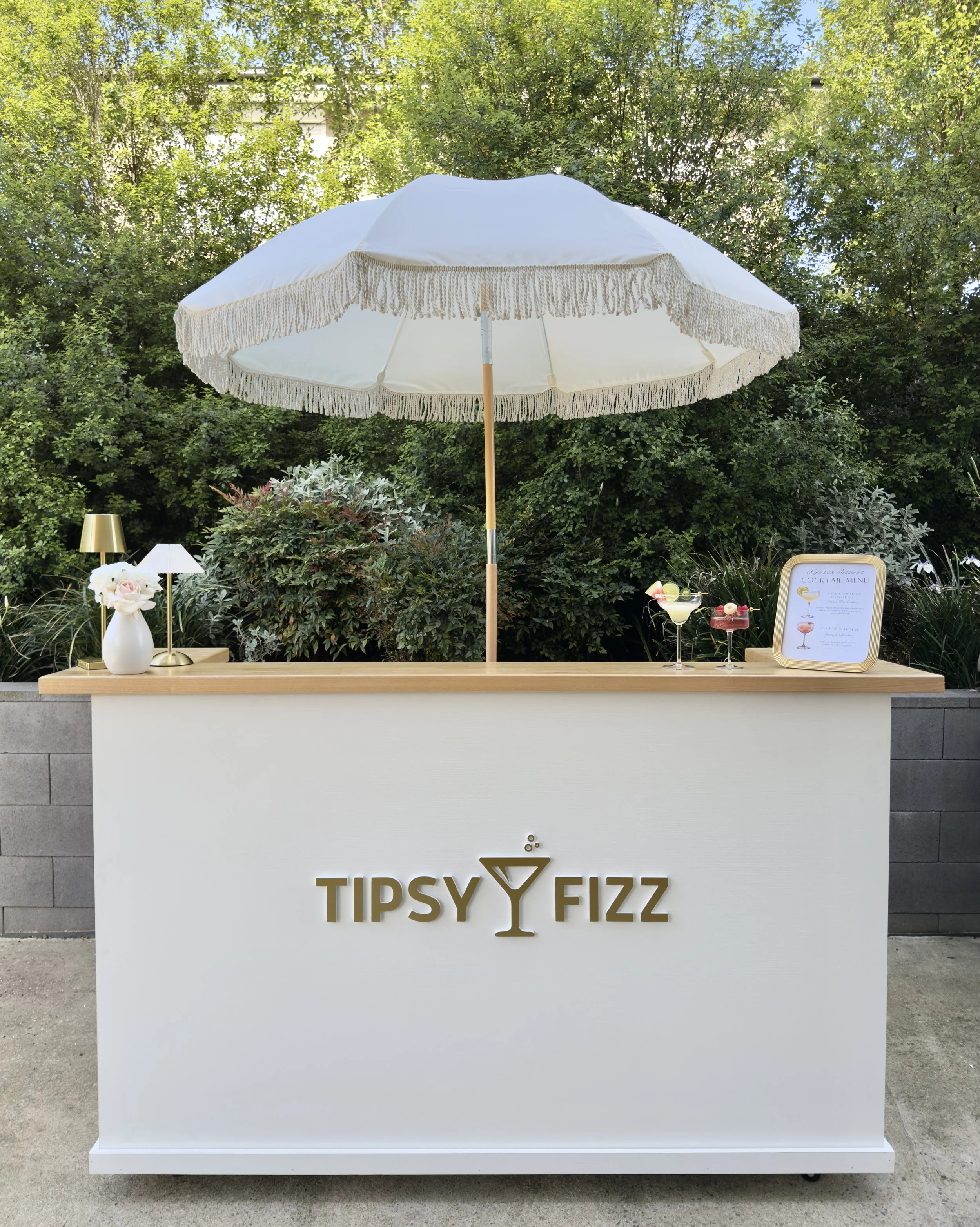 Mobile cocktail bar with outdoor umbrella